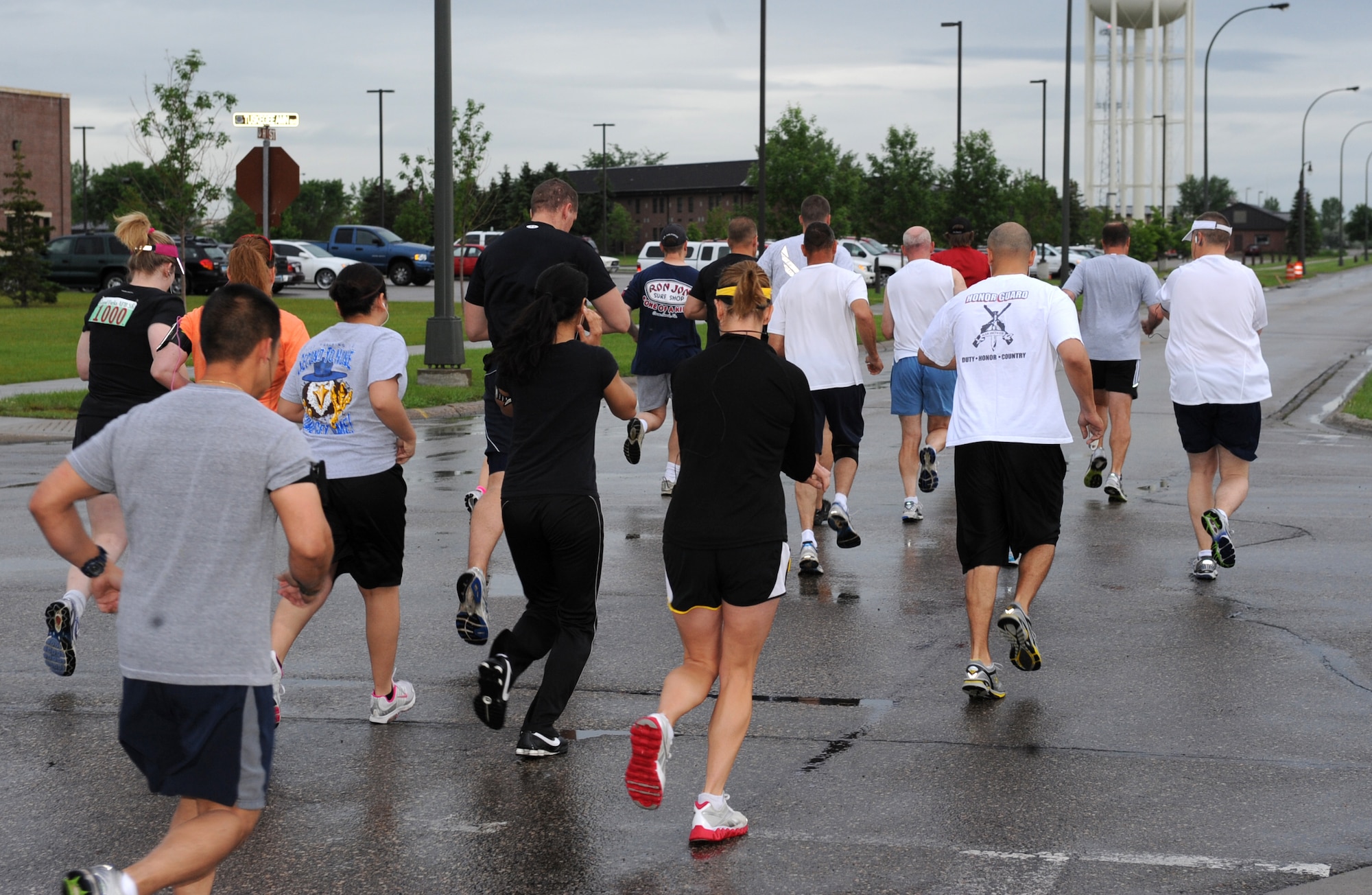 Participants in the Grand Forks Air Force Base Half-Marathon, begin their run outside the base fitness center June 15. This marathon is just one of the Fitness Center’s special events that are held every year. (U.S. Air Force photo by Airman 1st Class Amber Price)