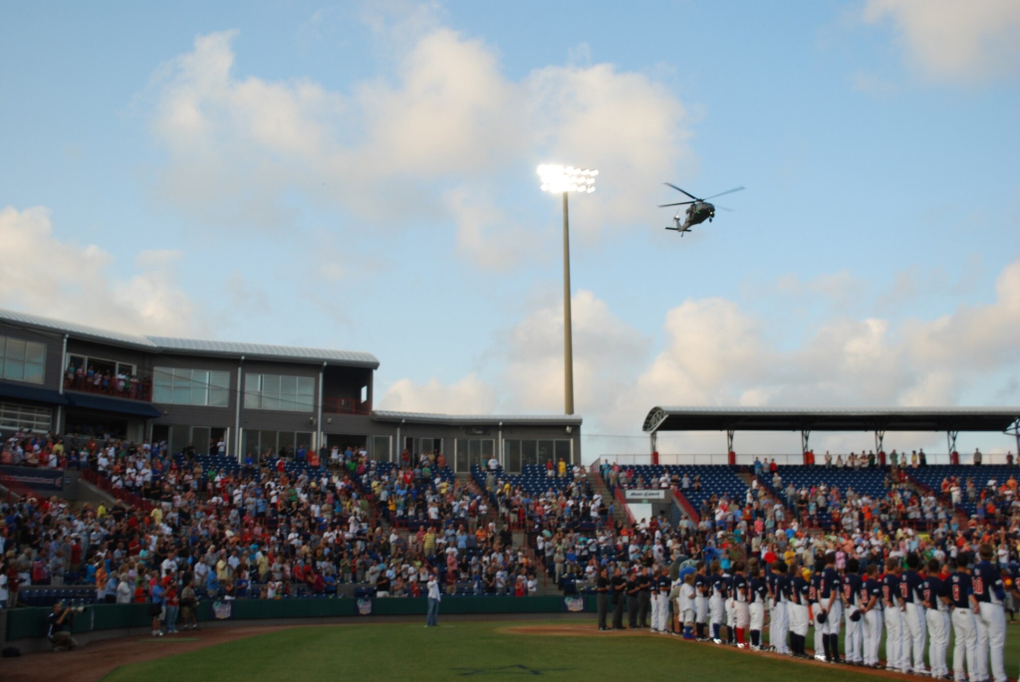 VIERA, Fla. ? An HH-60G Pave Hawk helicopter from the 920th Rescue Wing, Patrick Air Force Base, Cocoa Beach Fla., performs a fly-over during the opening ceremonies of the Florida All-Star Baseball game Saturday, June 12. The Air Force Reservists from the 920th RQW are called upon for their combat search and rescue expertise during times of war overseas and here, during times of American need. (U.S. Air Force photo/Mr. Christopher Calkins)