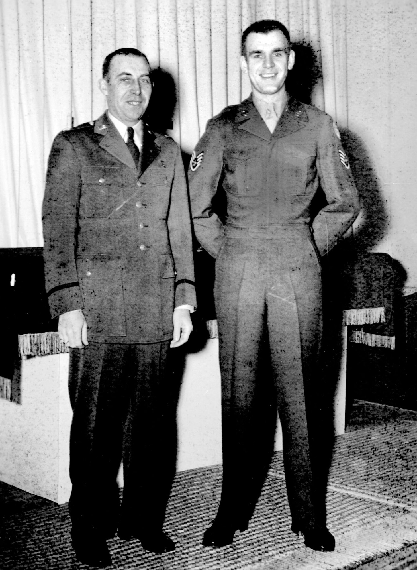 Chaplain Lt. Col. Russell L. Blaisdell and Staff Sgt. Merle “Mike” Strang. With Korean social workers, they drove a truck around Seoul searching out and rescuing homeless, sick, starving children from the streets. (U.S. Air Force photo)