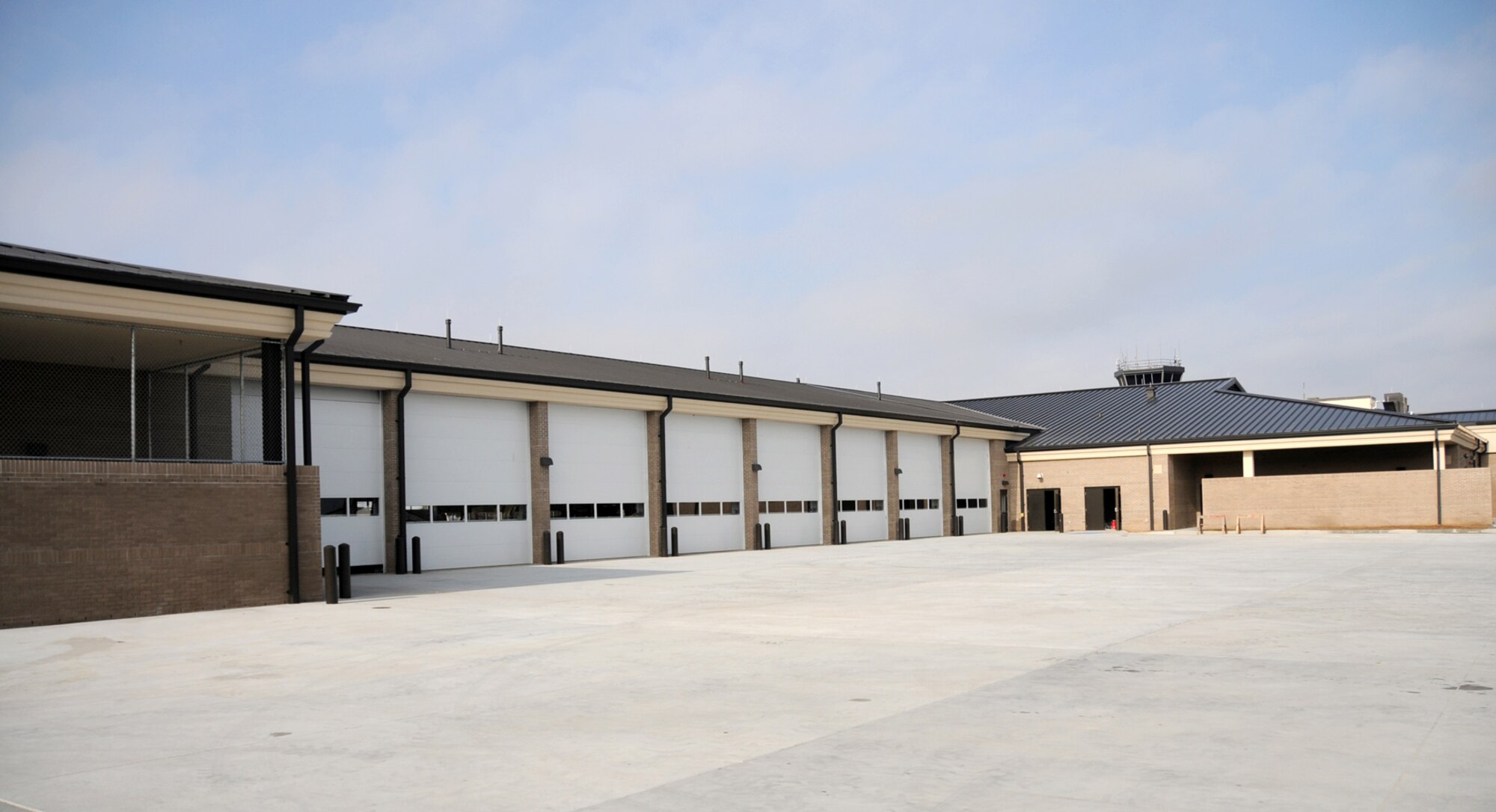 The new fire station features 50,000 square feet under roof and is built to withstand 150 mph winds.  Its upgraded safety features meet current DOD and National Fire Prevention Association standards.  (U.S. Air Force photo by Kemberly Groue)
