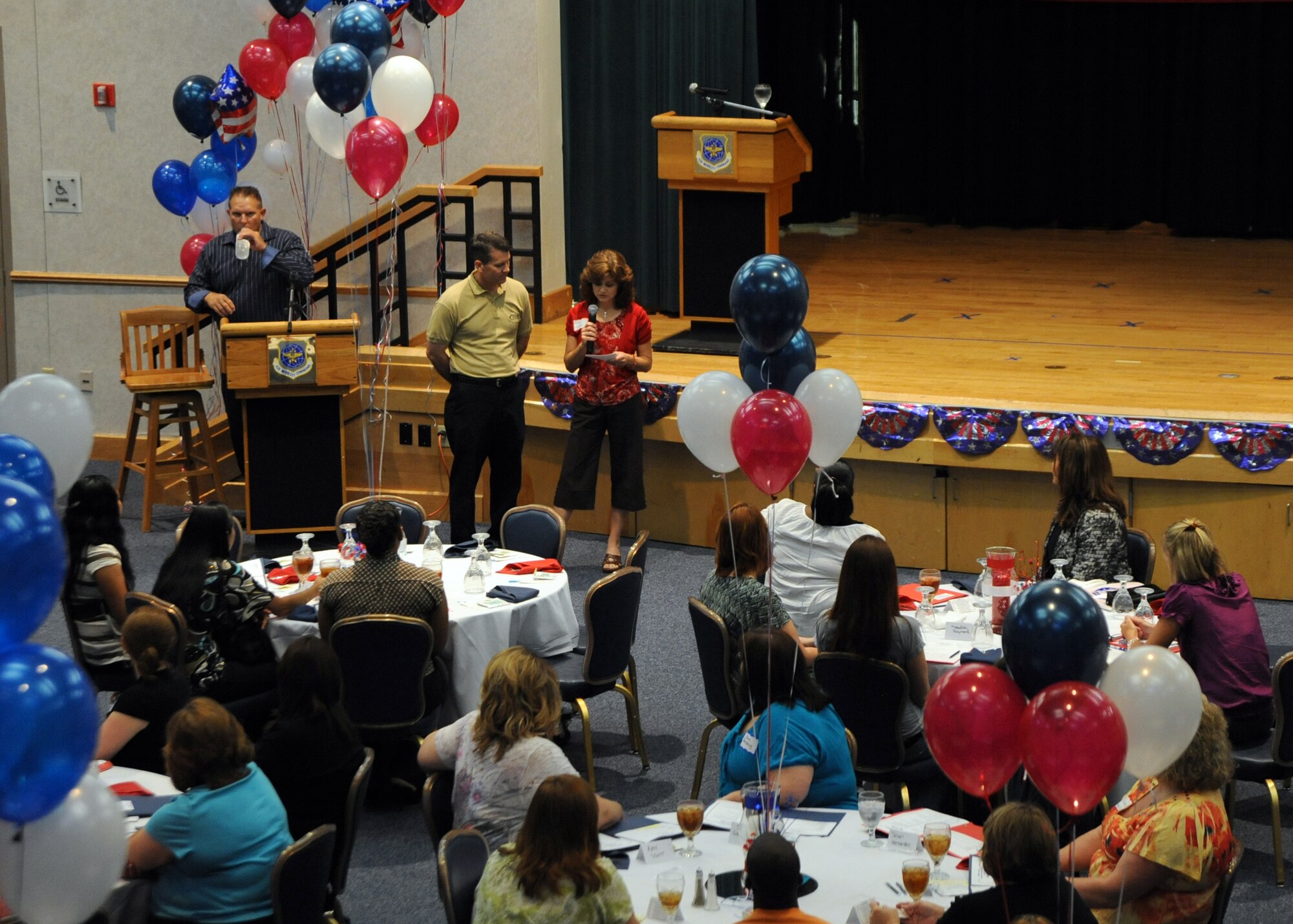 U.S. Air Force Col. Jamie Crowhurst, 22nd Air Refueling Wing commander, and his wife Lisa, speak to Team McConnell military spouses June 12, 2010, McConnell Air Force Base, Kan.  Colonel Crowhurst and his wife addressed the importance of having a strong and supportive spouse while also being in the military.  In honor of military spouses, McConnell’s Airman and Family Readiness Center hosted an appreciation conference designed for the spouses of all active-duty, Reserve, Guard servicemembers. (U.S. Air Force photo/Airman 1st Class Andrea Salazar)
