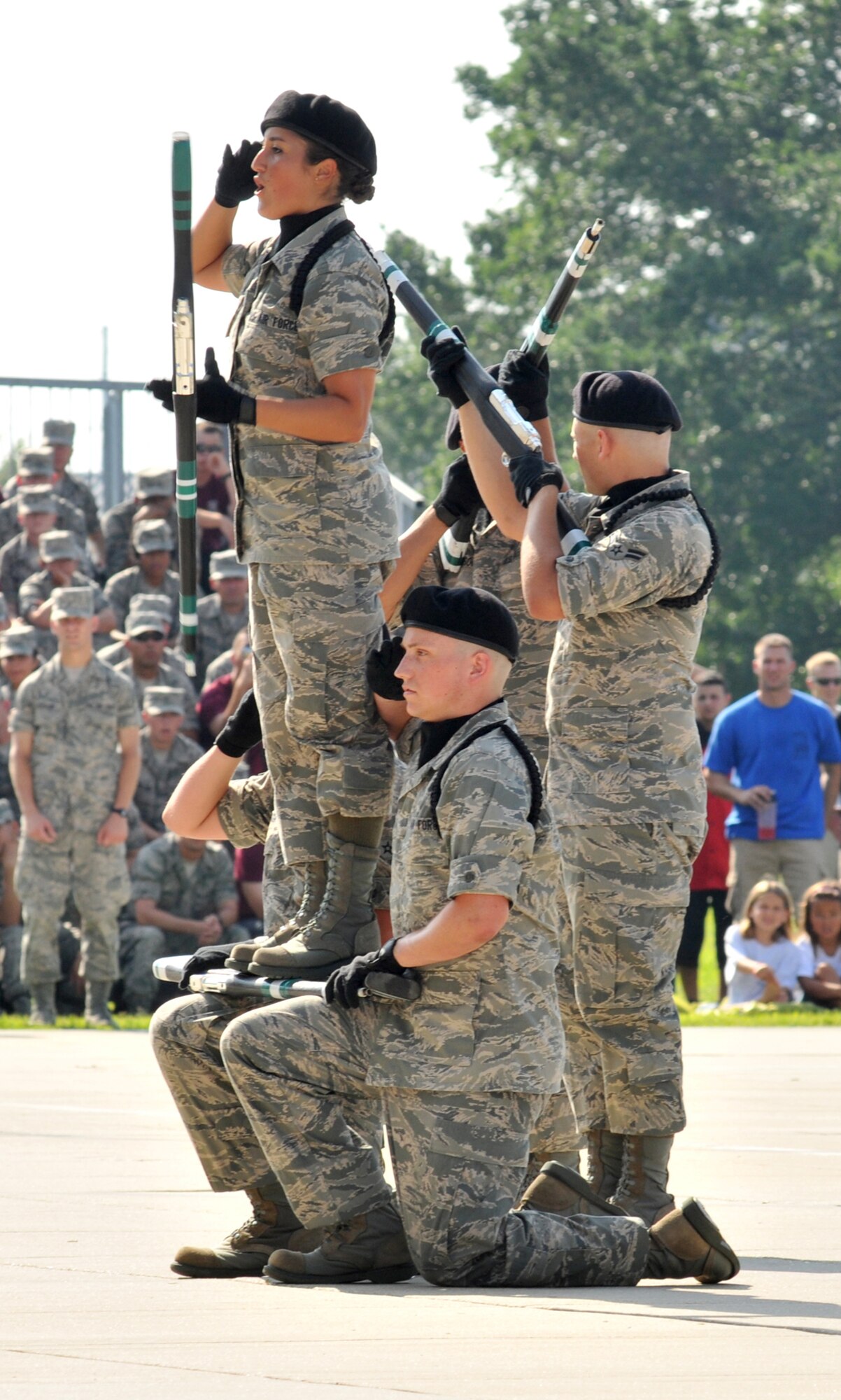 Airman Katlin Ayres is given a lift by her Gators teammates for a first place finish in the freestyle drill.  (U.S. Air Force photo by Adam Bond)
