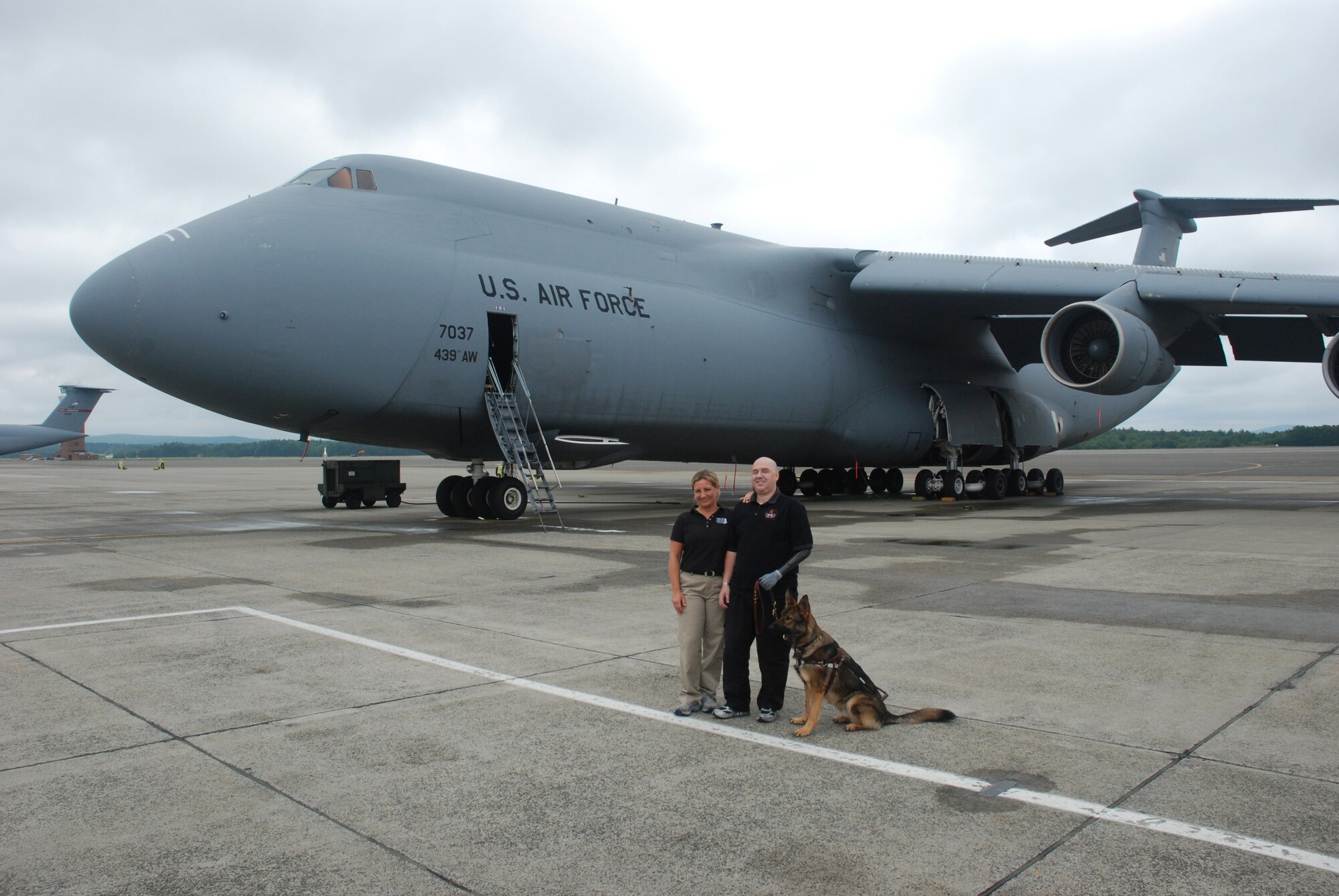 Tech. Sgt. Matt Slaydon, who was wounded by an IED in Iraq in 2007, paid a visit to the Westover explosive ordinance disposal team June 10.  Sergeant Slaydon, who lost his vision and his left arm in the blast, was in Conn. learning to work with his new guide dog when he came to tour Westover.