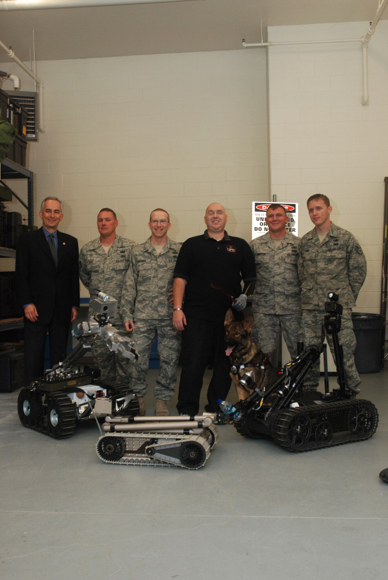 Tech. Sgt. Matt Slaydon, who was wounded by an IED in Iraq in 2007, paid a visit to the Westover explosive ordinance disposal team June 10.  Sergeant Slaydon, who lost his vision and his left arm in the blast, was in Conn. learning to work with his new guide dog when he came to tour Westover.