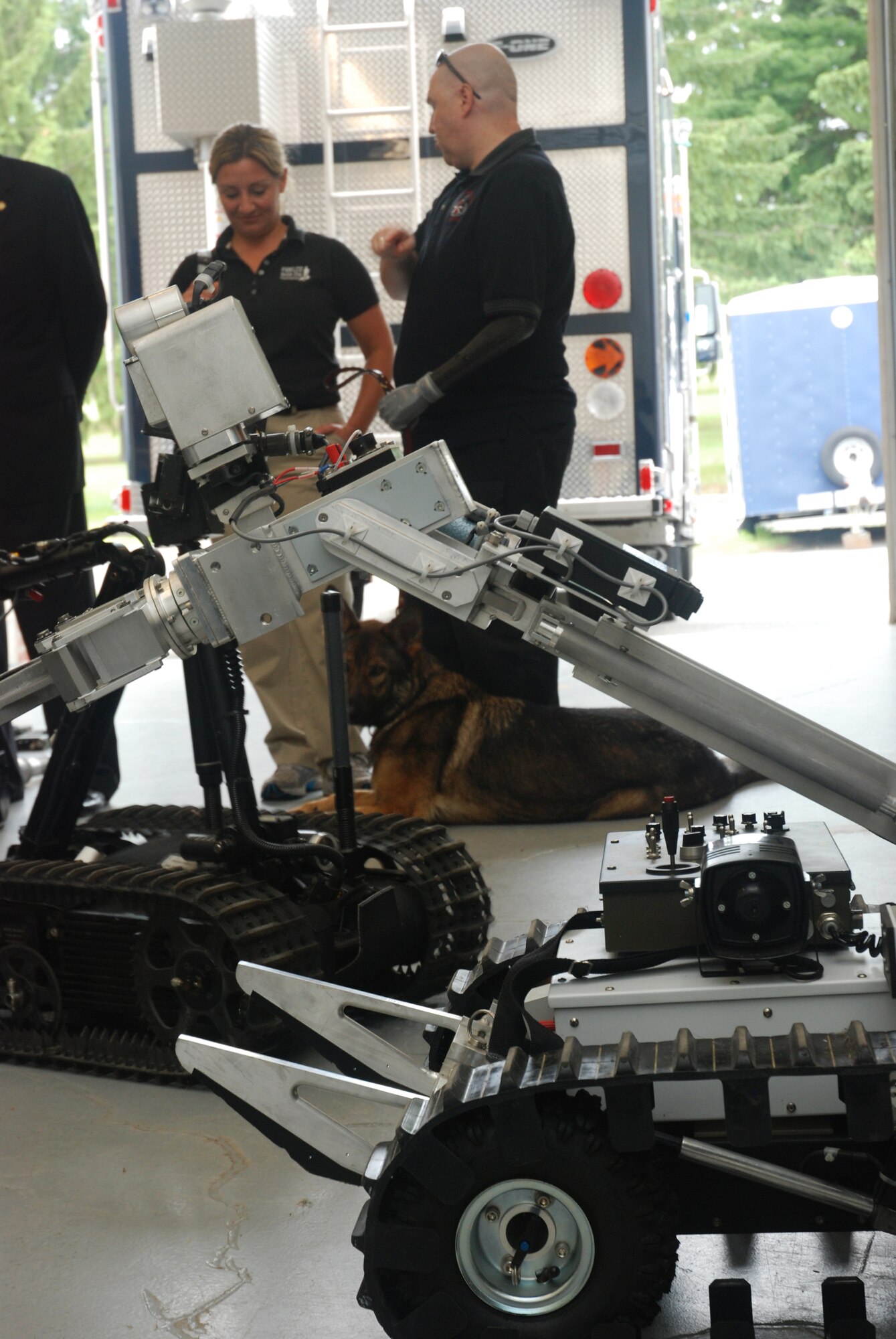 Tech. Sgt. Matt Slaydon, who was wounded by an IED in Iraq in 2007, paid a visit to the Westover explosive ordinance disposal team June 10.  Sergeant Slaydon, who lost his vision and his left arm in the blast, was in Conn. learning to work with his new guide dog when he came to tour Westover.