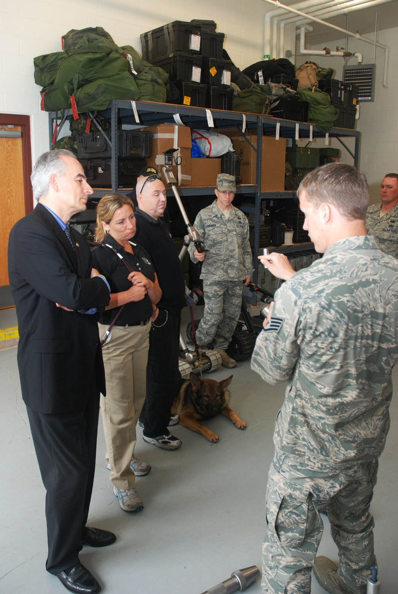 Tech. Sgt. Matt Slaydon, who was wounded by an IED in Iraq in 2007, paid a visit to the Westover explosive ordinance disposal team June 10.  Sergeant Slaydon, who lost his vision and his left arm in the blast, was in Conn. learning to work with his new guide dog when he came to tour Westover.