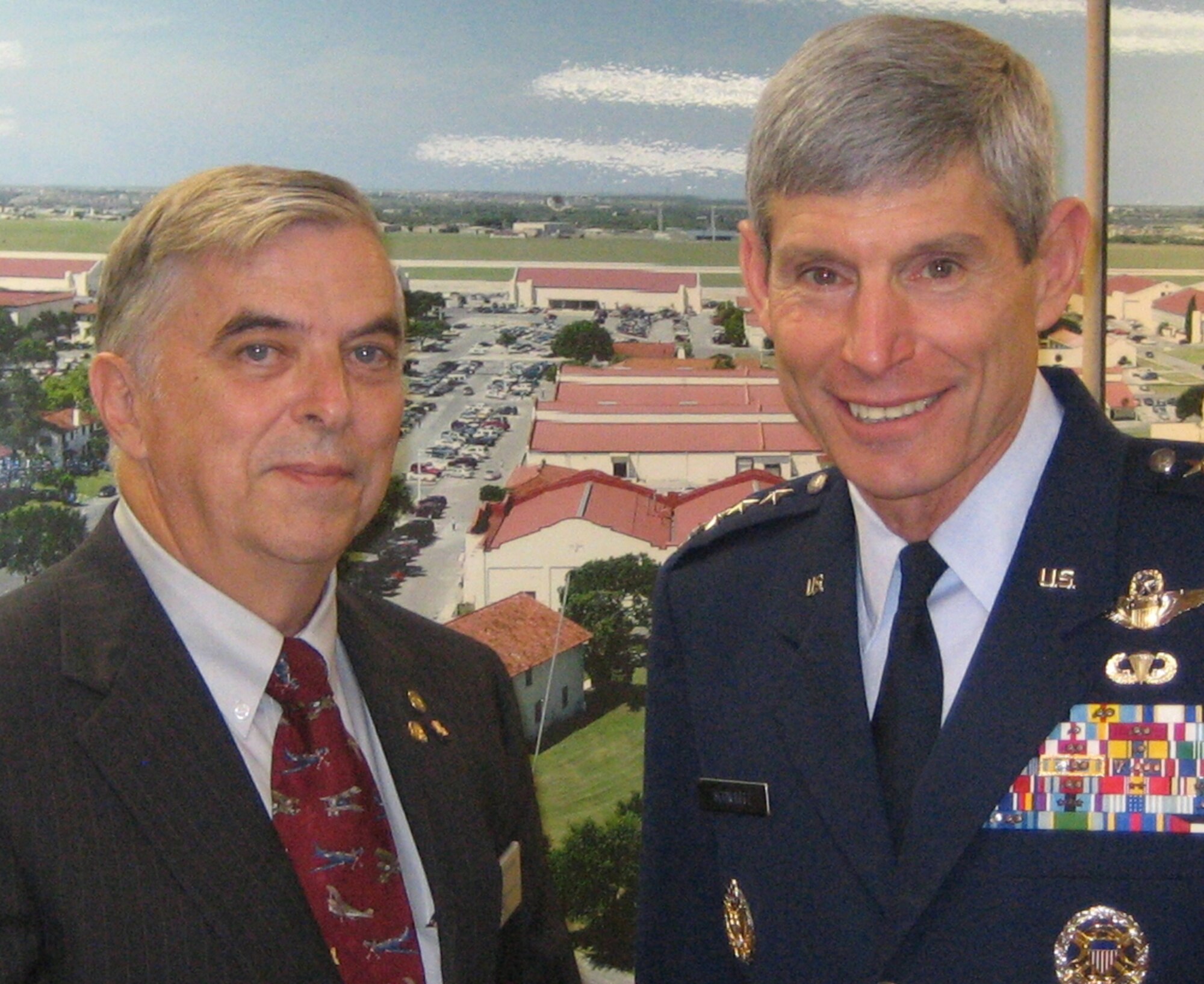Left, retired Col. Thomas Adams of the Keesler Retiree Affairs Office and Gen. Norton Schwartz, Air Force Chief of Staff pose for a photo.  (Photo by Roger Winburg)
