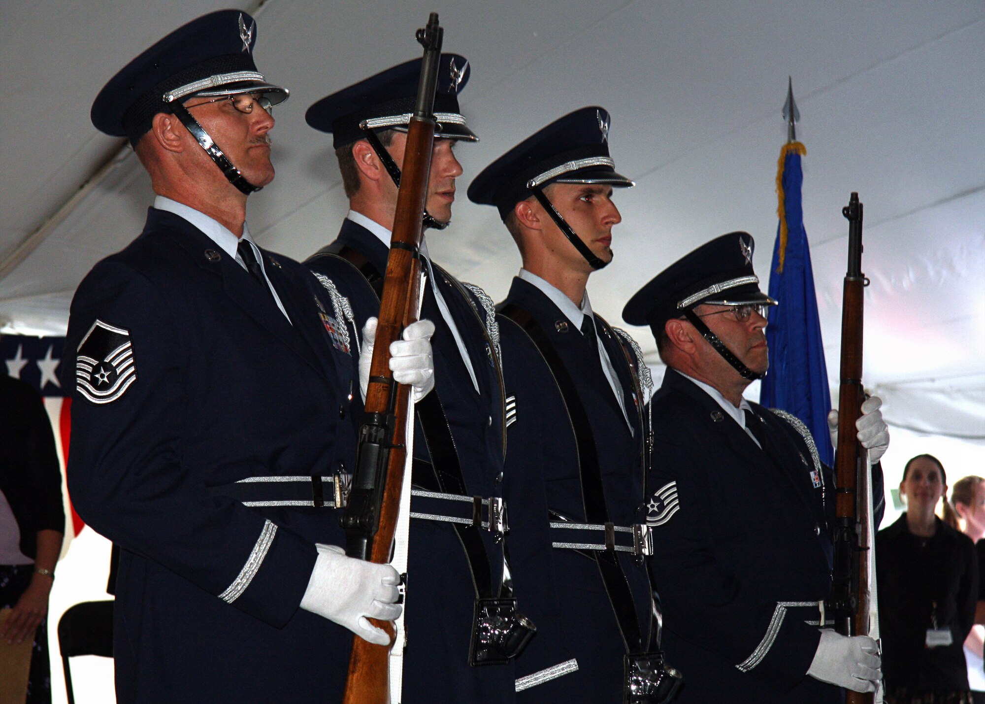 GRISSOM AIR RESERVE BASE, Ind. -- From left to right, Master Sgt. Tim Wood, Staff Sgt. Ben Durr, Staff Sgt. Anthony Abney and Tech. Sgt. David Kirk, all members of the Grissom Base Honor Guard, stand in formation after posting the Colors at an opening ceremony for a new Veterans Affairs community based outpatient clinic here June 8. The base honor guard performs various ceremonial duties in the community including presenting the Colors and performing military honors at funeral services. (U.S. Air Force photo/Tech. Sgt. Mark R. W. Orders-Woempner)