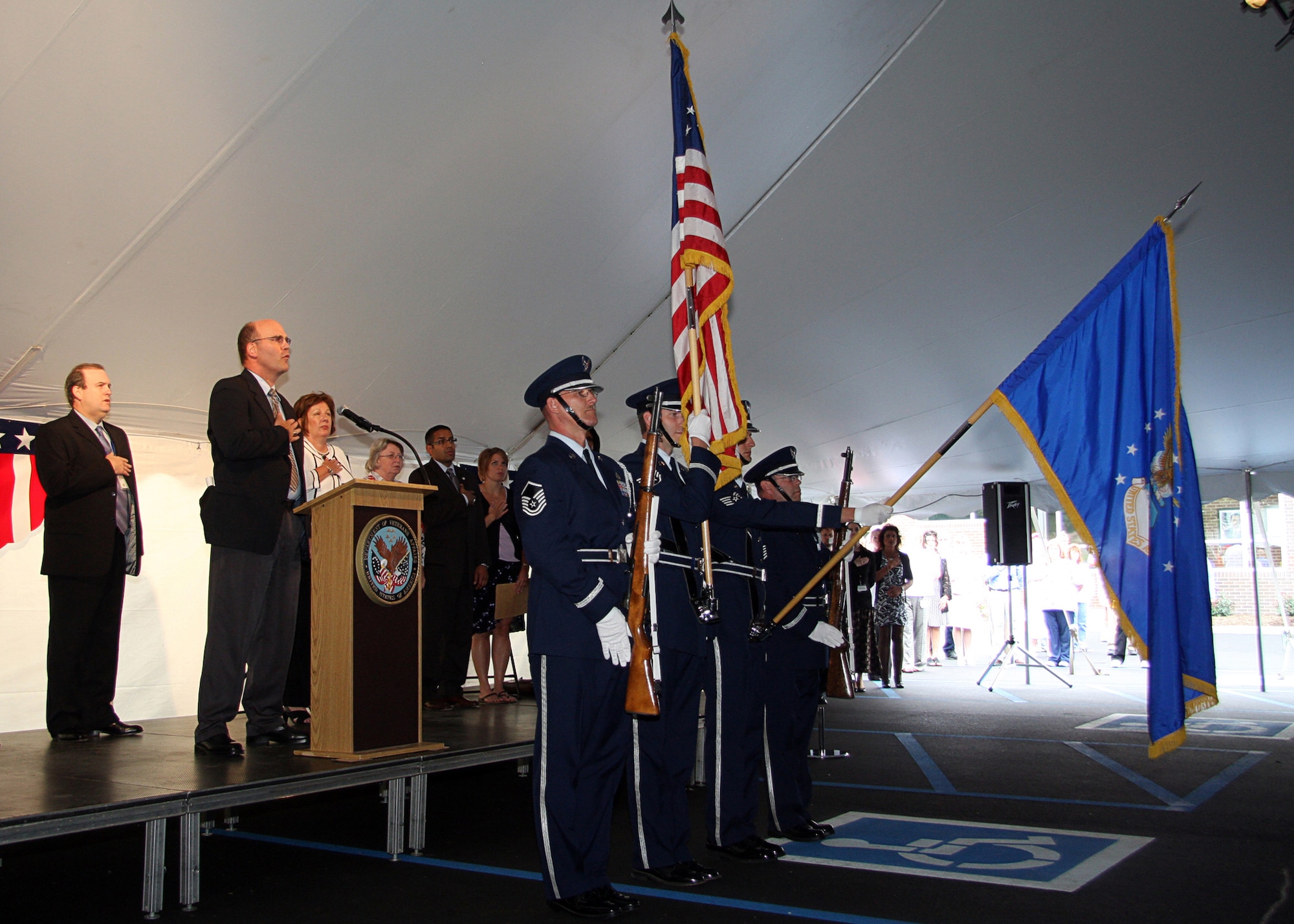 GRISSOM AIR RESERVE BASE, Ind. -- The Grissom Base Honor Guard presents the Colors at a opening of a Veteran's Affairs community based outpatient clinic in Peru, Ind., June 8. Base honor guard members from left to right, Master Sgt. Tim Wood, Staff Sgt. Ben Durr, Staff Sgt. Anthony Abney and Tech. Sgt. David Kirk. The base honor guard performs various ceremonial duties in the community including presenting the Colors and performing military honors at funeral services. (U.S. Air Force photo/Tech. Sgt. Mark R. W. Orders-Woempner)