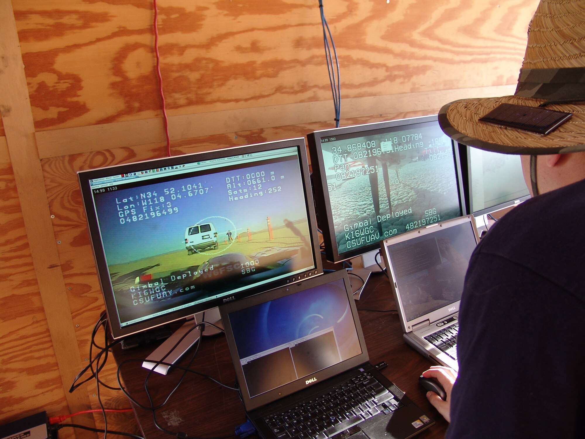 An engineer looks at the display for an unmanned aerial vehicle built by Fresno State University students.  Air Force Flight Test Center engineers have been helping Fresno State students with their UAV project, which they demonstrated at Edwards June 11.