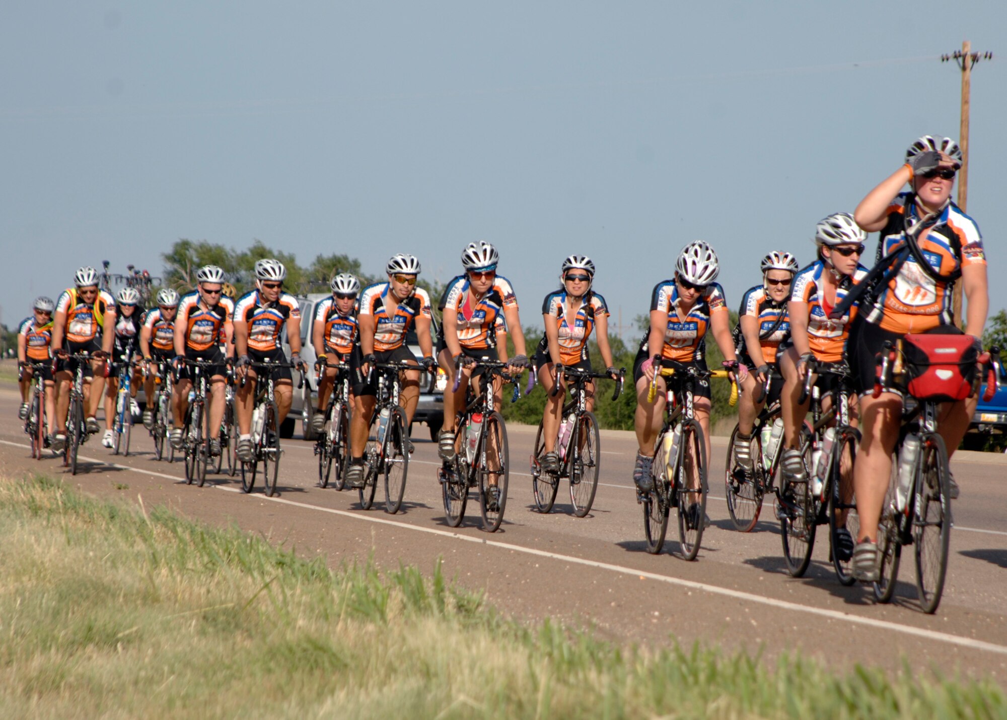 University of Texas at Austin students near Clovis, N.M., where they will spend the evening with Cannon Air Force Base Airmen in town. The students are members of Texas 4000, an organization that raises money to fight cancer. Each student pledged $4,500 in a trek that will take them to Anchorage, Alaska, 4,500 miles from their starting point. (U.S. Air Force photo by Greg Allen)