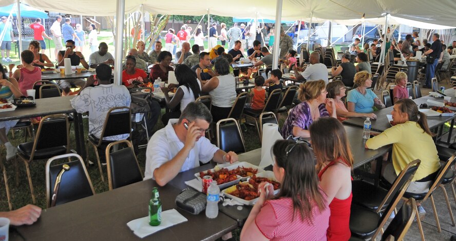 BARKSDALE AIR FORCE BASE, La. – Several tents were set up for Barksdale Airmen and their families to enjoy the shade while they eat crawfish during the Barksdale Crawfish Festival June 11. Approximately 500 people attended the festival and more than 700 pounds of crawfish boiled. (U.S. Air Force photo by Senior Airman Alexandra M. Boutte) (RELEASED)