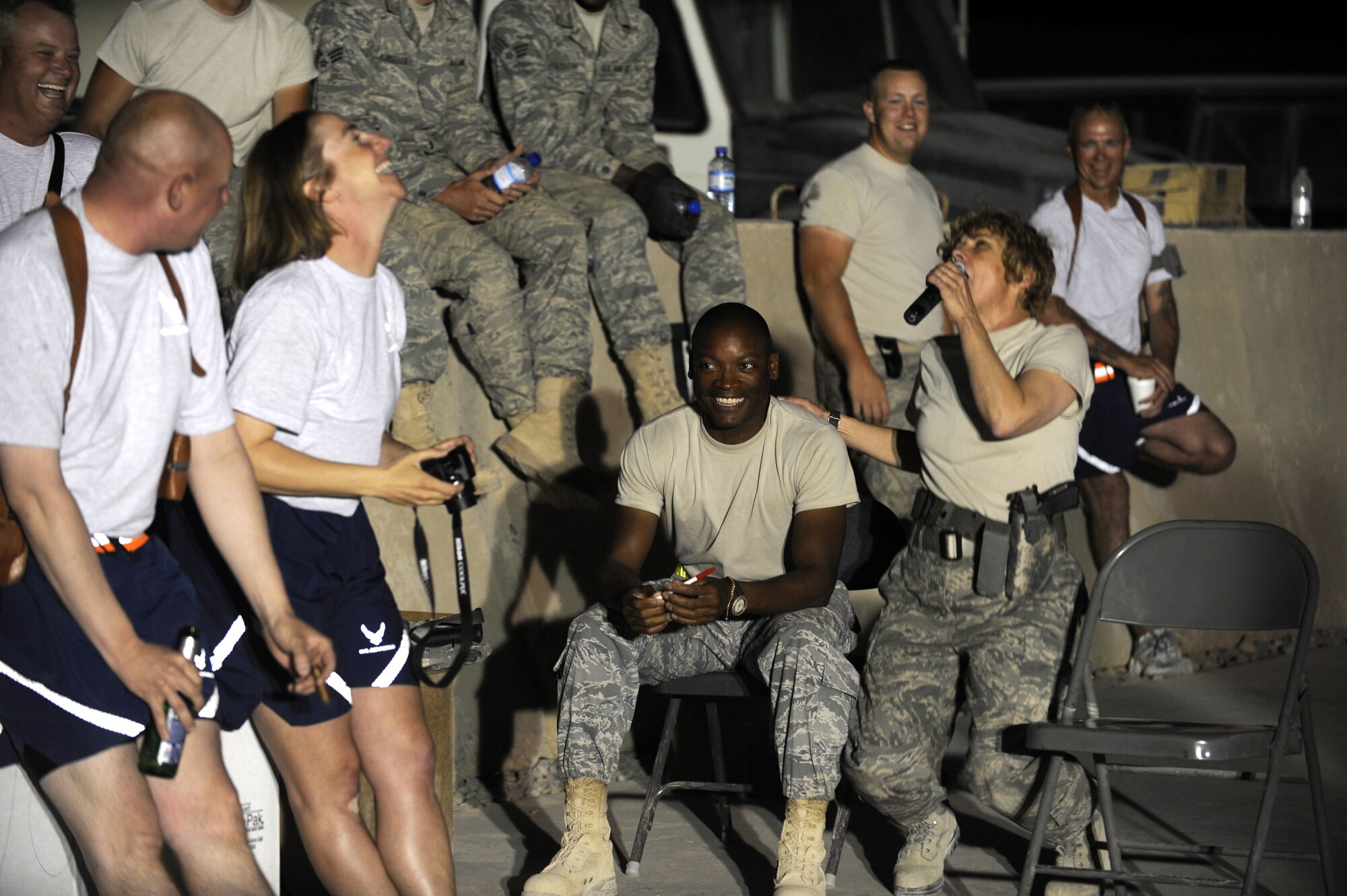 Members of the U.S. Air Forces Central Command Band perform for the 809th RED HORSE Squadron May 5 at Kandahar Airfield, Afghanistan.  This band performs a variety of music all throughout the AOR.  (U.S. Air Force photo by Senior Airman Nancy Hooks/Released)