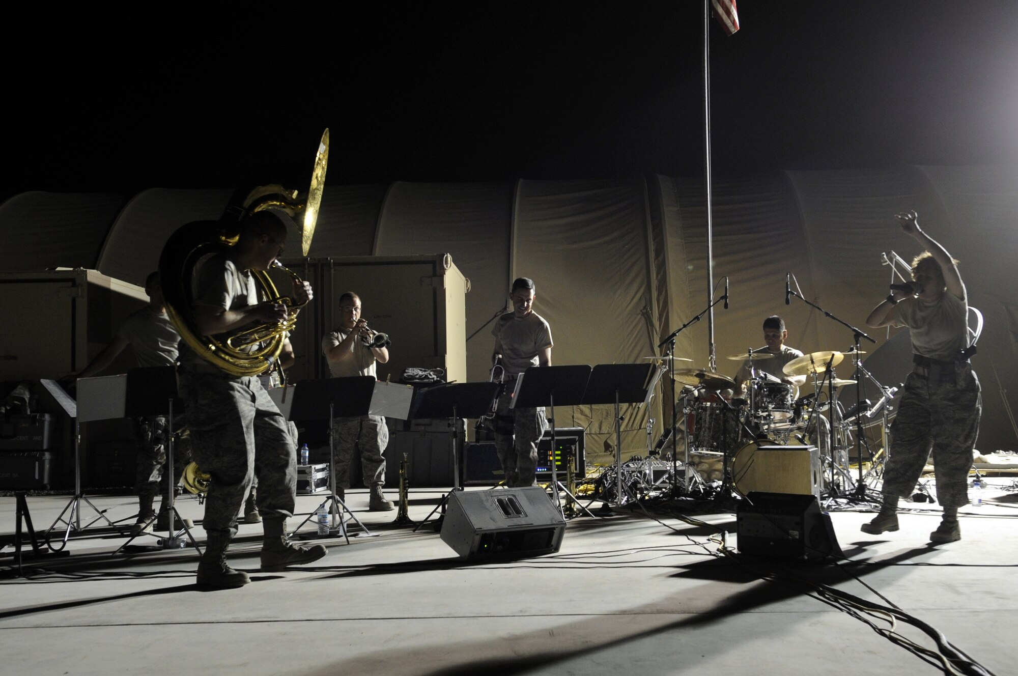 Members of the U.S. Air Forces Central Command Band perform for the 809th RED HORSE Squadron May 5 at Kandahar Airfield, Afghanistan.  This band performs a variety of music all throughout the AOR.  (U.S. Air Force photo by Senior Airman Nancy Hooks/Released)
