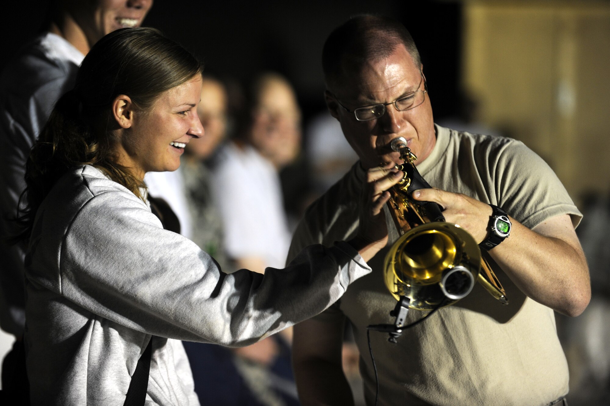 Airmen from the 809th 1st Expeditionary Rapid Engineer Deployable Heavy Operations Repair Squadron Engineers, or RED HORSE, join the U.S. Air Forces Central Command Band, Vector, and play instruments during one of the band’s performances June 5 at Kandahar Airfield, Afghanistan. (U.S. Air Force photo by Senior Airman Nancy Hooks)
