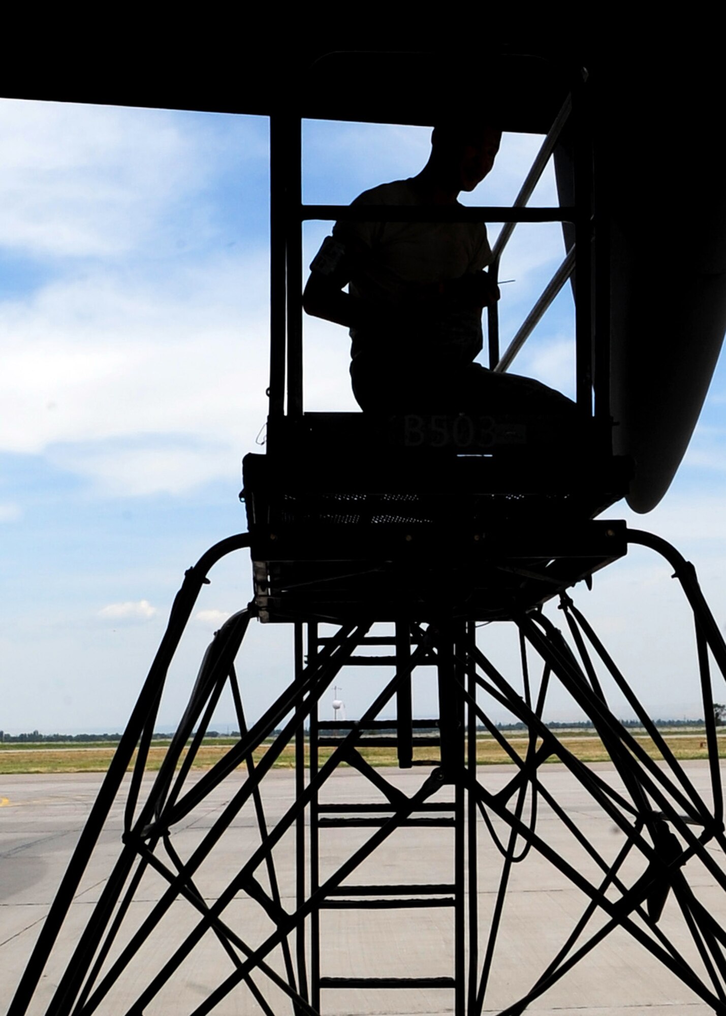 An Airman from the 376th Expeditionary Aircraft Maintenance Squadron conducts routine maintenance on a C-17 Globemaster III essential in recovering the aircraft after arrival to the Transit Center at Manas, Kyrgyzstan, June 8, 2010. (U.S. Air Force photo/ Senior Airman Nichelle Anderson/ released)