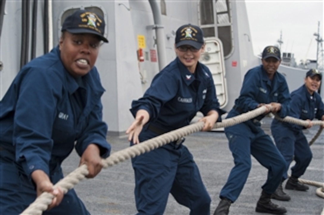 U.S. Navy Seaman Tecara Gray (left), Petty Officer 3rd Class Renee Cabrales, Seaman Ashley Sowells and Petty Officer 3rd Class Maraalysa Maneru (right) heave aboard the forward lines as the amphibious transport dock ship USS New Orleans (LPD 18) departs San Diego on a three-month deployment for Southern Partnership Station 2010 on June 10, 2010.  Southern Partnership Station aims to enhance cooperative partnerships with maritime forces from Argentina, Mexico, Peru, Brazil, Uruguay and Colombia.  