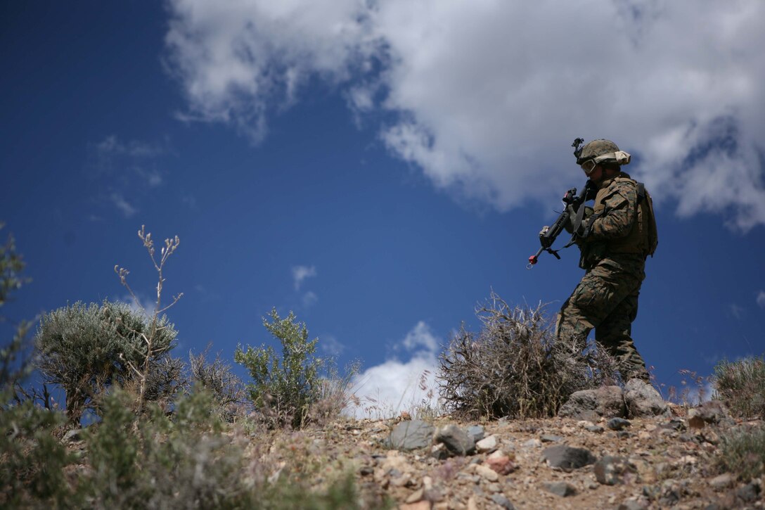A Marine with 1st Battalion, 25th Marine Regiment, searches the ground in front of him for possible improvised explosive devices during a training exercise June 16, 2010. The IED training was conducted as part of exercise Javelin Thrust 2010. ::r::::n::