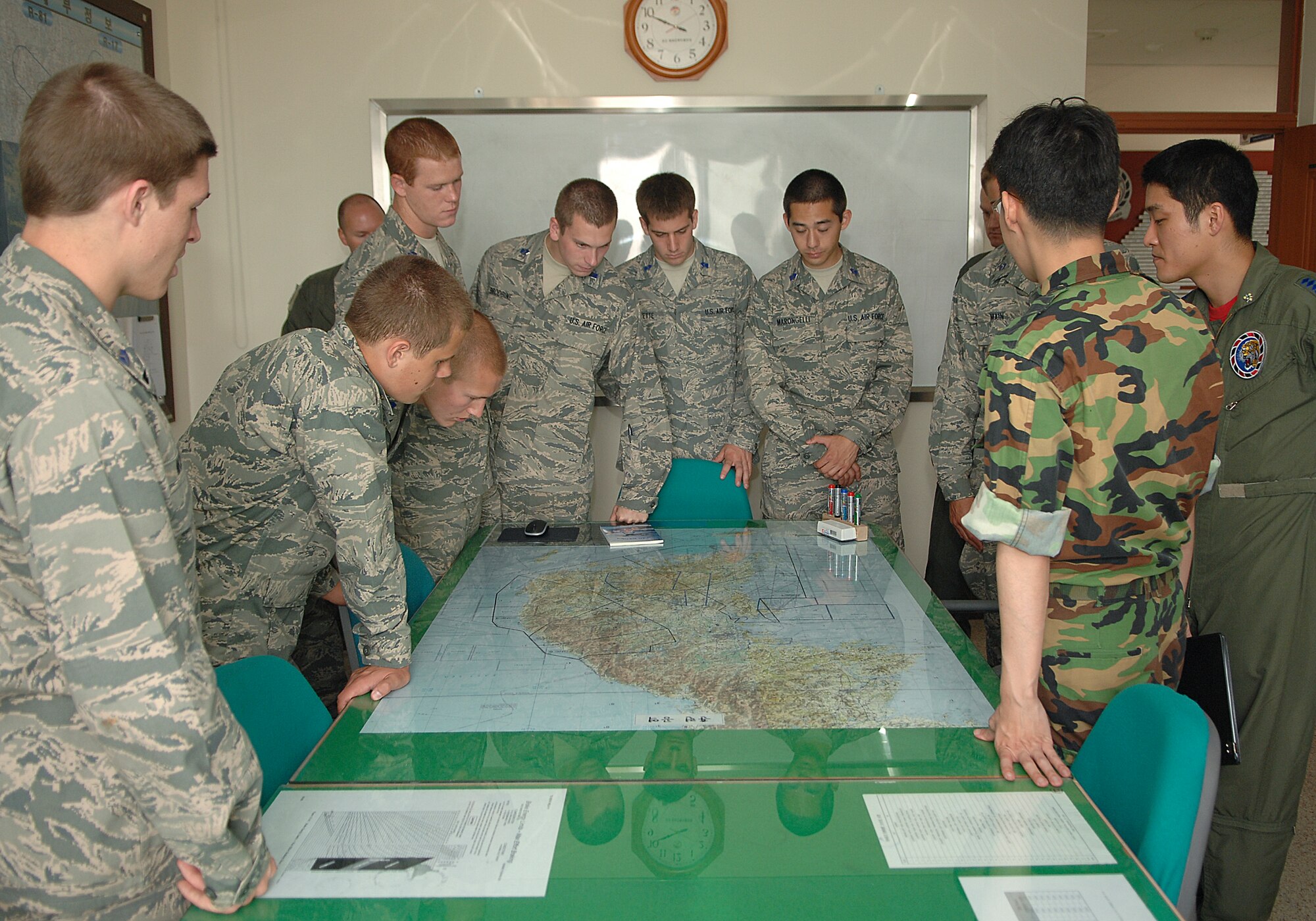 KUNSAN AIR BASE, Republic of Korea -- U.S. Air Force Academy and Air Force Reserve Officers’ Training Corps cadets are given a tour of the 38th Fighter Group by Republic of Korea Air Force personnel during an Operation Air Force program visit here June 11. Operation Air Force is a three-week summer course given to USAFA and ROTC cadets to expose the cadets to the real operational Air Force.  (U.S. Air Force photo/Courtesy Photo)