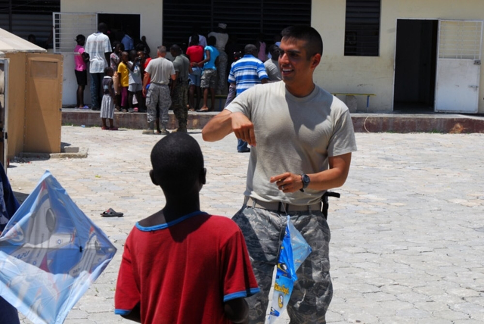 Capt. Jose Linares, 38th Cyberspace Engineering Group, volunteered to deploy to Haiti to help with relief efforts. Once there he also volunteered at Foyer L’escale Orphanage, above. (Courtesy photo)