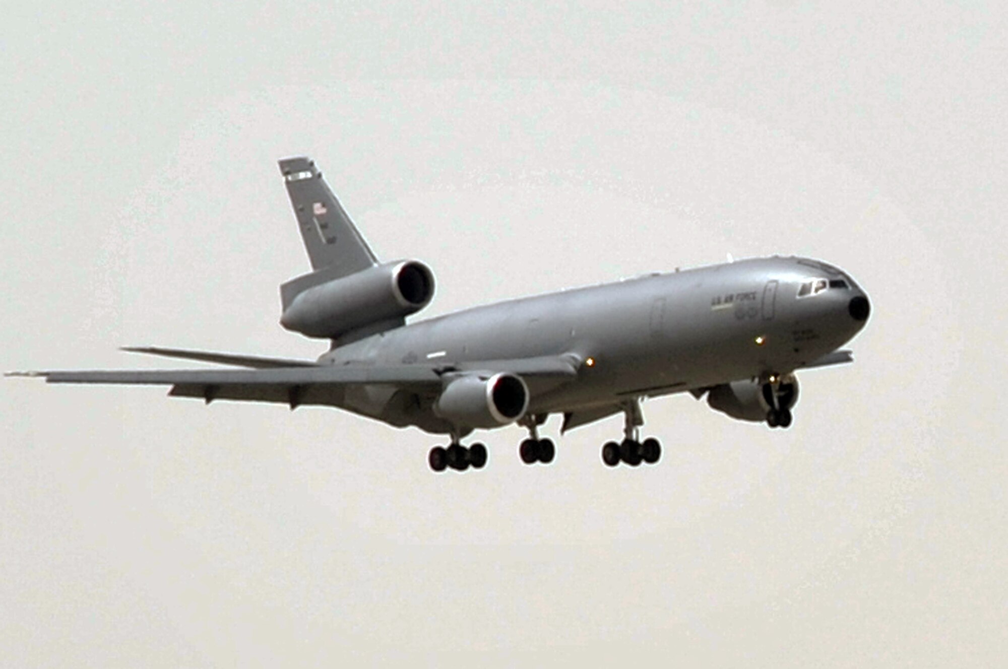A flight crew from the 908th Expeditionary Air Refueling Squadron guides a KC-10 Extender, also from the 908th EARS, in for a landing at a non-disclosed base in Southwest Asia on June 2, 2010. According to statistics from Mr. Yancy Mailes, 380th AEW historian, KC-10s assigned to the 908th EARS and the Airmen who support and fly them flew more than 230 missions off-loading nearly 35 million pounds of fuel to more than 2,100 aircraft from January through April 2010. The 908th EARS, as part of the 380th Air Expeditionary Wing, supports operations Iraqi Freedom, Enduring Freedom, and the Combined Joint Task Force-Horn of Africa. The 908th EARS is a sub-unit of the 380th Air Expeditionary Wing. In addition to the KC-10 Extender, the 380th AEW is home to the U-2 Dragon Lady, E-3 Sentry and RQ-4 Global Hawk aircraft. The wing is comprised of four groups and 12 squadrons and the wing's deployed mission includes air refueling, surveillance and reconnaissance in support of overseas contingency operations in Southwest Asia. (U.S. Air Force Photo/Master Sgt. Scott T. Sturkol/Released)