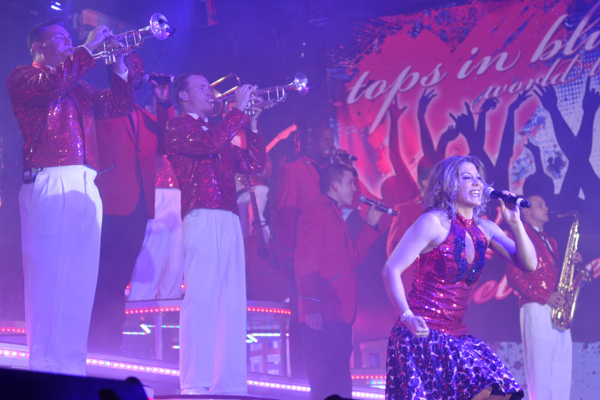 Vocalist, Airman First Class Lisa Weiss, performs for a packed house during
a concert by the TOPS IN BLUE performers at Hoban Hall on Barksdale Air
Force Base, La., June 15, 2010. Airman Weiss is a services apprentice
attached to the 171st Force Support Squadron with the Pittsburgh Air
National Guard, PA. TOPS IN BLUE is one of the oldest and most widely
traveled entertainment groups of its kind. It has a distinctive history,
spanning 57 years. The 2010 tour, entitled "We Believe," is a salute to the
ideas we believe in as Americans. (U.S. Air Force photo/Tech. Sgt. Jeff
Walston)
