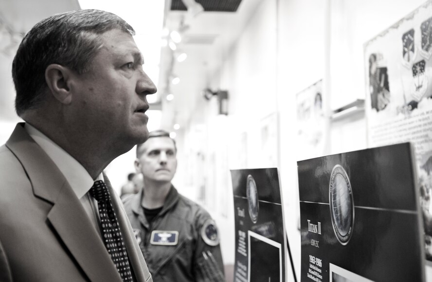 VANDENBERG AIR FORCE BASE, Calif. -- Secretary of the Air Force Michael Donley looks at a display featuring some of Vandenberg's previous launches during a tour of base facilities June 15, as Brig. Gen. Timothy Ray, Air Force Global Strike Command Director of Operations, looks on. During his visit, Secretary Donley met with base leadership, toured facilities and observed a Minuteman III launch, the first under Air Force Global Strike Command. (U.S. Air Force photo/Senior Airman Ashley Reed)