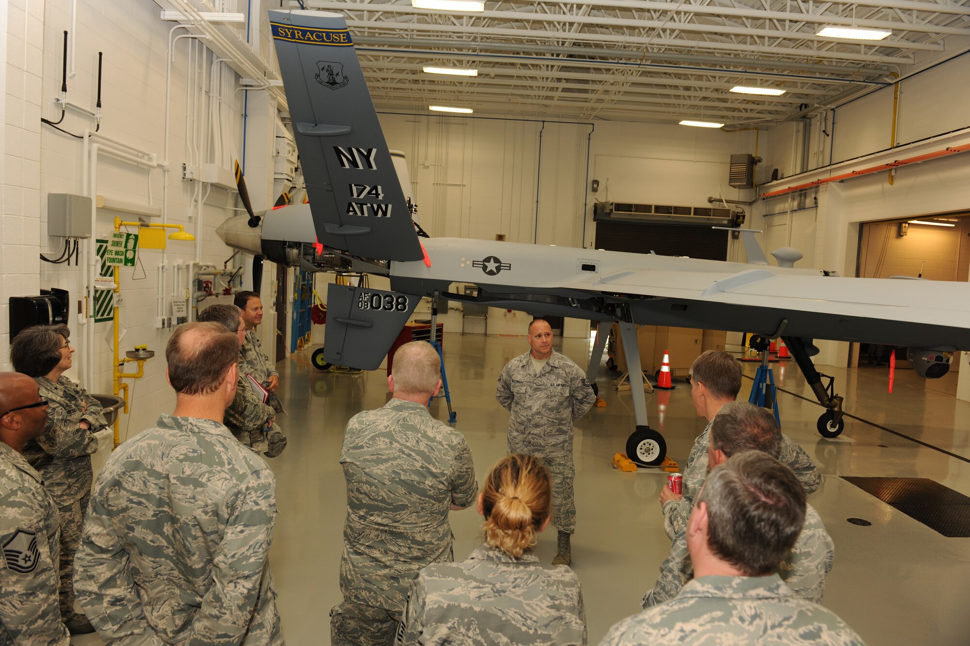 Members of the Air National Guard (ANG) Council of the Judge Advocate General of the Air Force (TJAG) touring the 174th Fighter Wing’s Field Training Detachment, the site where all MQ-9 Reaper maintenance personnel (active duty Air Force, Air National Guard and Air Force Reserve) obtain specialized training to perform various maintenance functions.