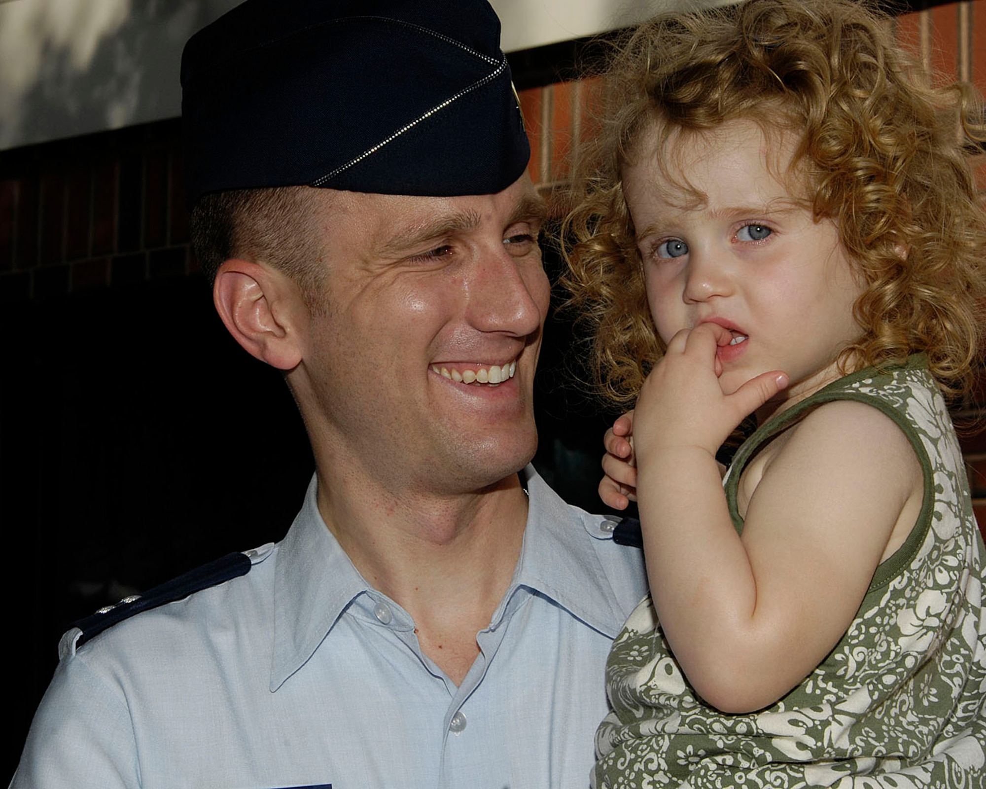 HANSCOM AIR FORCE BASE, Mass. – Capt. Charles O’Connor greets his daughter Lily at the Child Development Center on June 15. (U.S. Air Force photo by Linda LaBonte Britt)