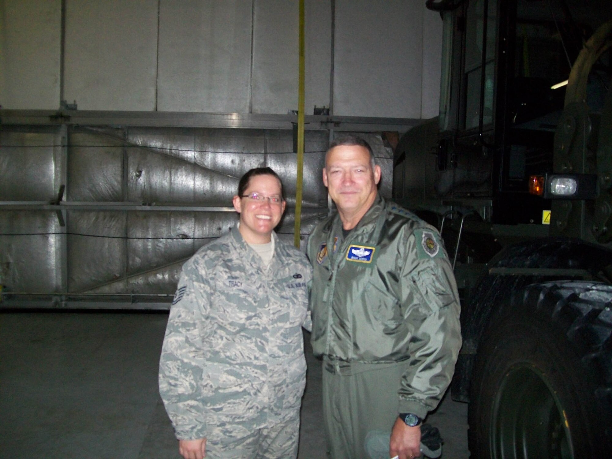 WRIGHT-PATTERSON AIR FORCE BASE, Ohio – Tech. Sgt. Anna Tracy, 445th Logistics Readiness Squadron, met with Gen. Gary North, the Pacific Air Forces commander, during his visit to Alaska to observe and learn first-hand about the 2010 Operation Arctic Care April 9-23. Eight reservists from the 445th Airlift Wing had the opportunity to help Alaskan natives in need of humanitarian medical, dental, optometry and veterinary care during the operation. (Courtesy photo)