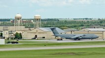 MINOT AIR FORCE BASE, N.D. – A C-5 Galaxy from Wright-Patterson AFB, Ohio, is loaded with supplies as it refuels here before flying off to Anderson AFB, Guam, June 8.  The C-5 was at Minot AFB in support of the 23rd Bomb Squadron deployment, and will provide essential parts needed to provide continuous bomber presence in the Pacific Region.  (U.S. Air Force photo by Staff Sgt. Miguel Lara III)