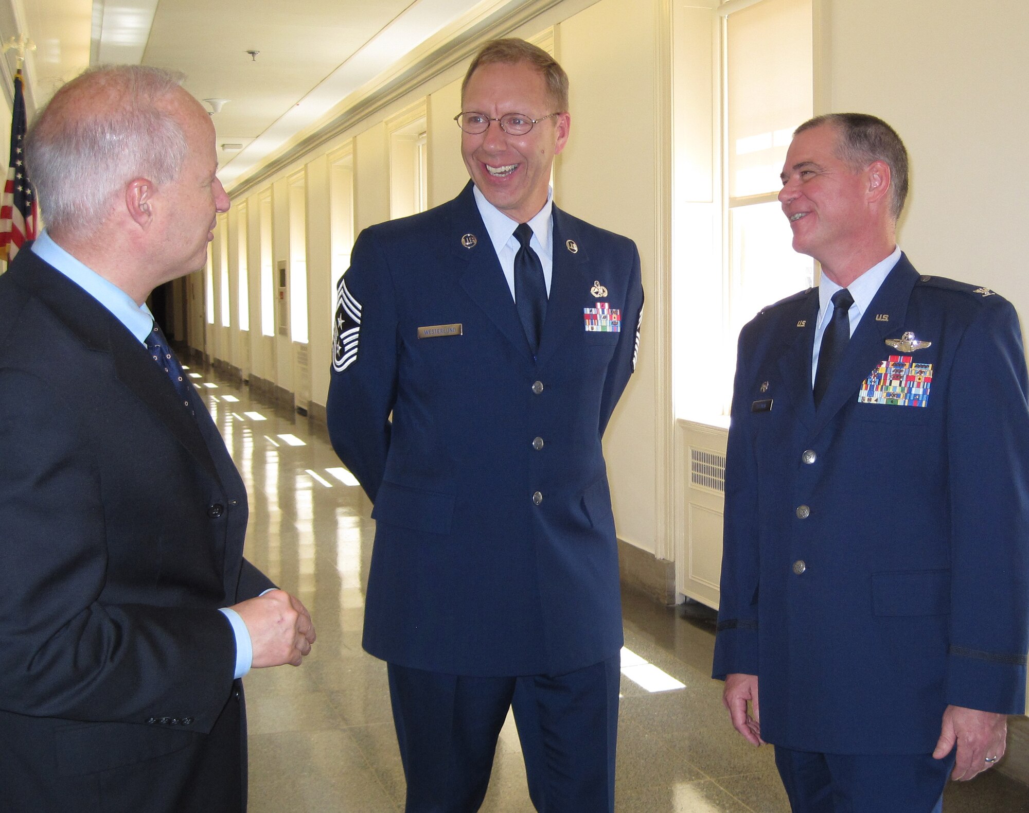 Col. Jay Pittman (far right) and Chief Master Sgt. Joseph Westerlund provide Colorado Rep. Mike Coffman with an update on 302nd Airlift Wing current deployments and missions during a June 10 office call in Washington D.C. The meeting with the congressman, who is from the state’s 6th District, was part of the Air Force Reserve Integration Orientation Course that gave leadership from the 302nd AW, an Air Force Reserve organization, the opportunity to share updates on the wing's recent and upcoming deployments as well as significant events. Colonel Pittman is the 302nd AW’s commander, while Chief Westerlund is the wing’s command chief. (U.S. Air Force photo/Ann Skarban)