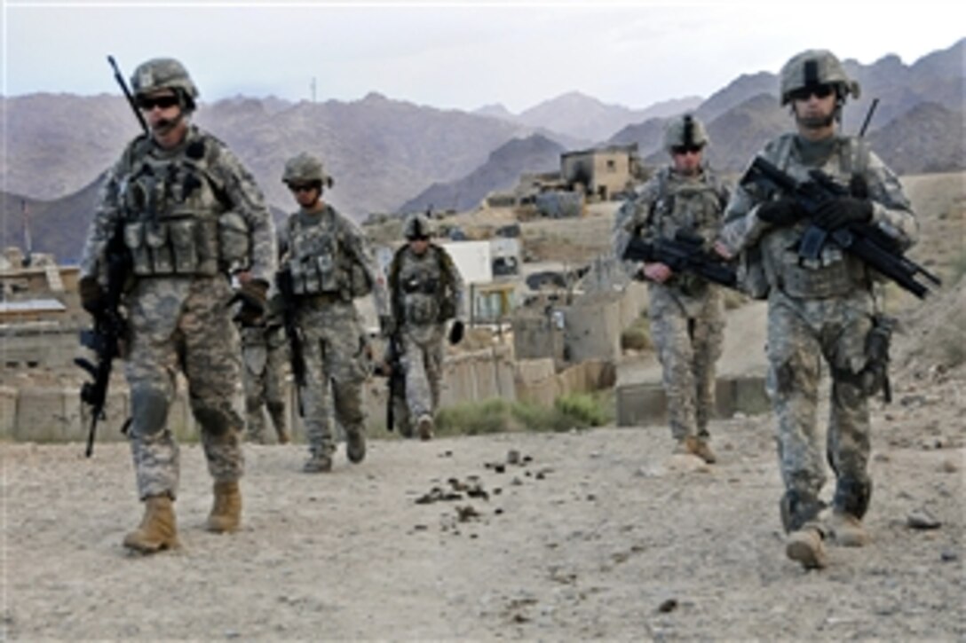 U.S. Army soldiers depart Forward Operating Base Baylough in Zabul province, Afghanistan, to conduct a patrol, June 16, 2010. The soldiers are assigned to Company D, 1st Battalion, 4th Infantry Regiment.