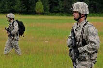 Airman 1st Class Justin Padley, right, and Staff Sgt. Ryan Hawbaker, 115th Security Forces, participate in a combat patrol at Volk Field Combat Readiness Training Center, Wis., June 13, 2010. The 115th SFS took part in a week long combat exercise as part of yearly training for members.  (U.S. Air Force photo by Tech Sgt. Ashley Bell)