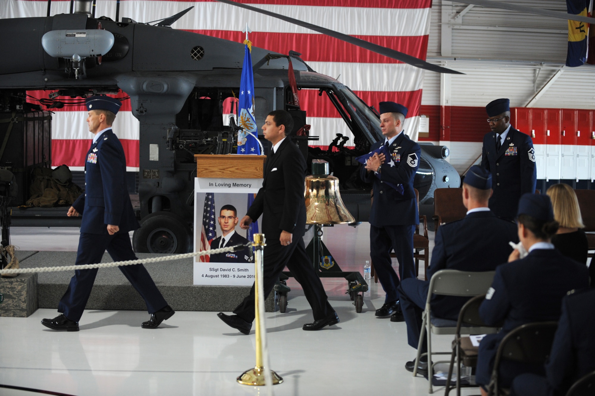 NELLIS AIR FORCE BASE, Nev. -- Members from the 66th Rescue Squadron exit a memorial ceremony at Nellis Air Force Base, Nev. June 18 to honor 1st Lt. Joel Gentz, 25, a combat rescue officer assigned to the 58th Rescue Squadron; and Staff Sgt. David Smith, 26, a helicopter flight engineer assigned to the 66th Rescue Squadron. The two were among four Airmen killed and three wounded when an HH-60G Pave Hawk helicopter crashed during a medevac mission in southeastern Afghanistan June 9.  (U.S. Air Force photo by Master Sgt. Kevin Gruenwald) 



