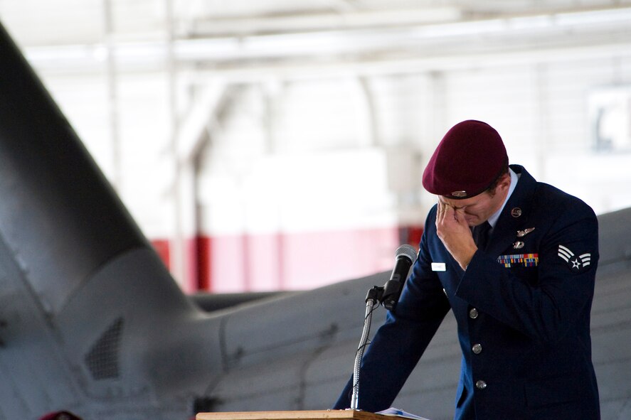 NELLIS AIR FORCE BASE, Nev. -- Senior Airman Joshua Degenhardt,  pararescueman pays his final respect to 1st Lt. Joel Gentz, 25, a combat rescue officer assigned to the 58th Rescue Squadron a memorial ceremony at Nellis Air Force Base June 18.  1st Lt. Gentz was among four Airmen killed when his HH-60G Pave Hawk helicopter crashed during a medevac mission in southeastern Afghanistan June 9. (U.S. Air Force Photo / Lawrence Crespo)