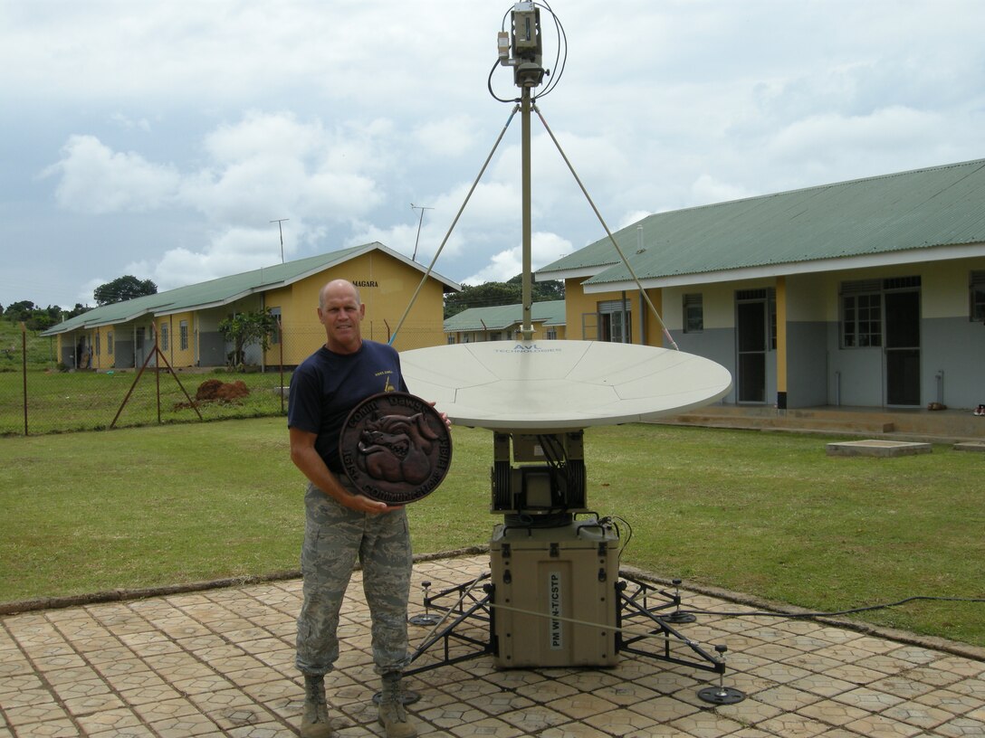 MSgt David Zibell in Djibouti in front of a SNAP terminal.