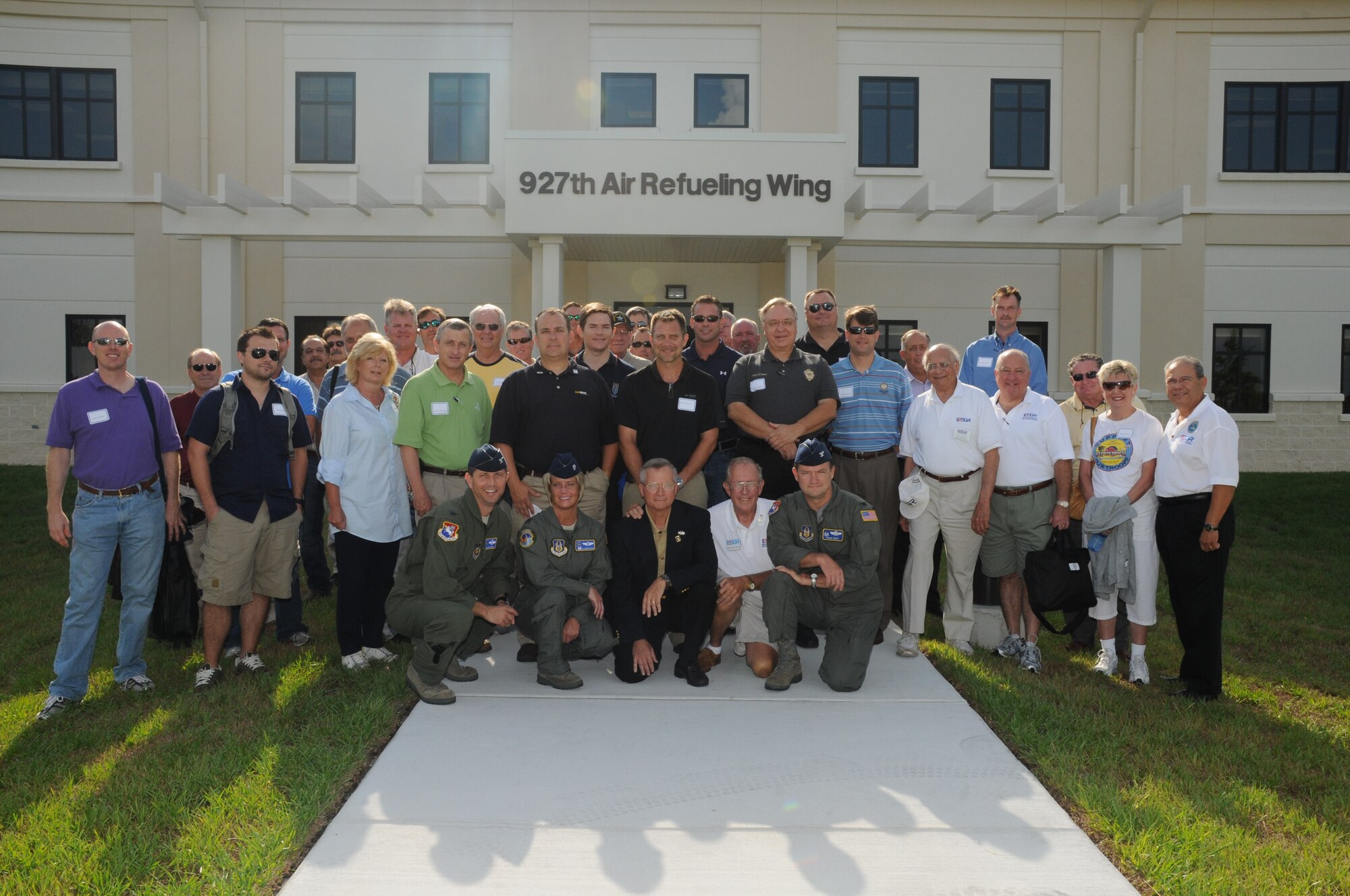 Approximately 30 local employers and five representatives for Employer Support of the Guard and Reserve stand in front of the 927th Air Refueling Wing Headquarters before taking part in an ESGR bosslift June 18, 2010 at MacDill Air Force Base, Fla. (U.S. Air Force photo by Senior Airman Anna-Marie Wyant)

