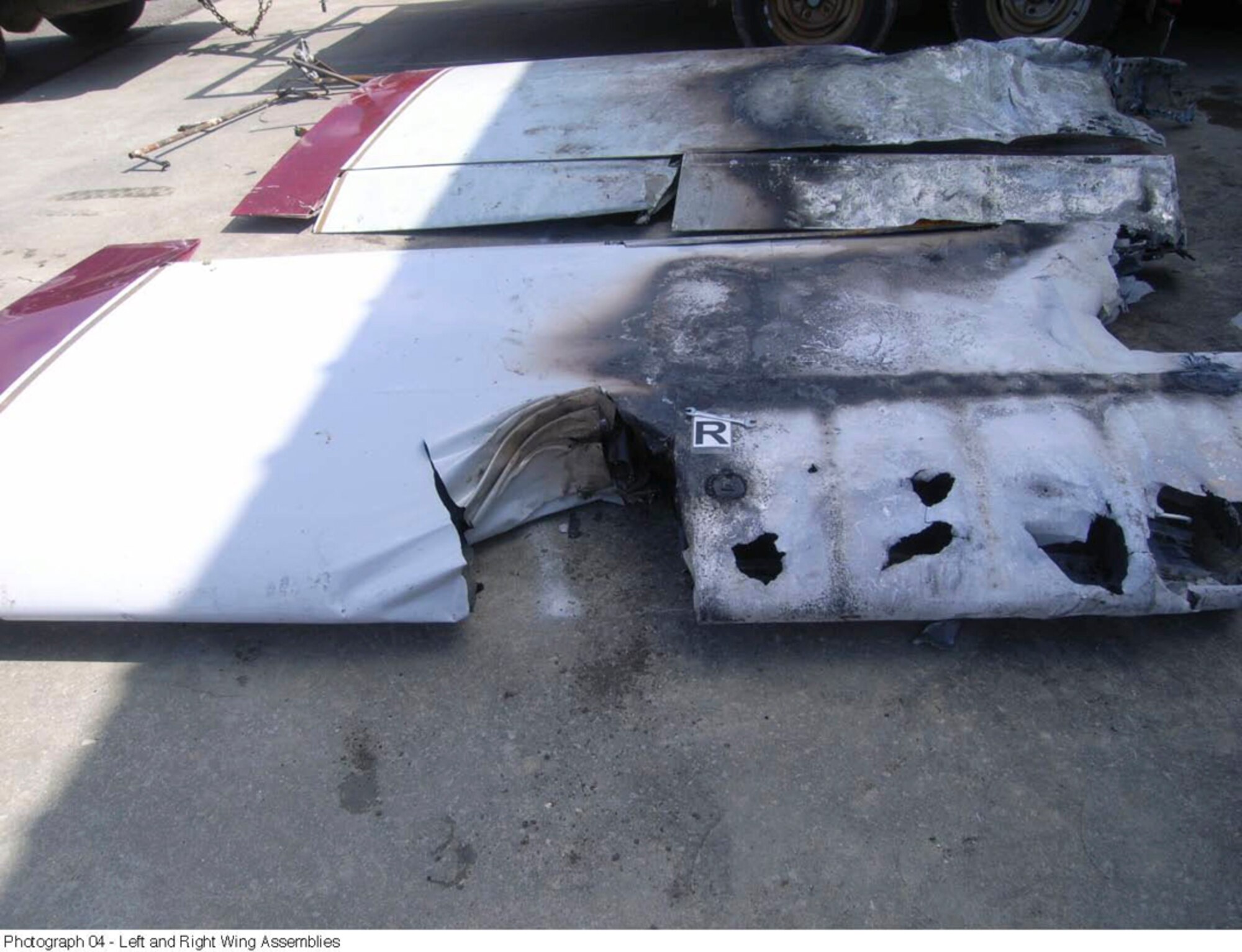 (3) When a Brown RV-6 light aircraft crashed on take-off, each wing struck a tree, rupturing the fuel tanks. The spilled fuel immediately caught fire, killing the two pilots who were trapped inside the canopy. (Photos courtesy of the National Transportation Safety Board)