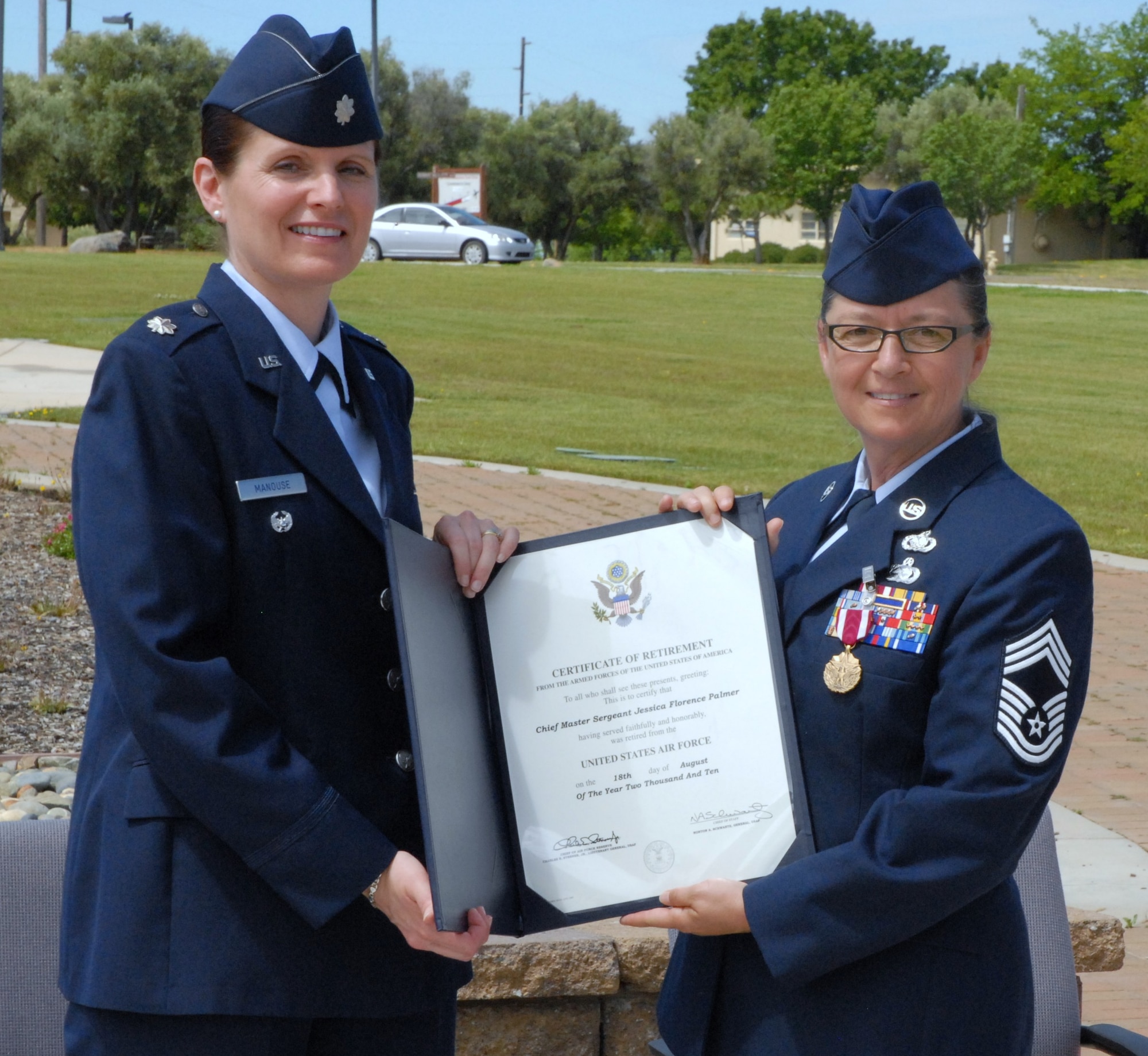 Lt. Col. Manouse presented the certificate of retirement to Chief Palmer during the ceremony.
