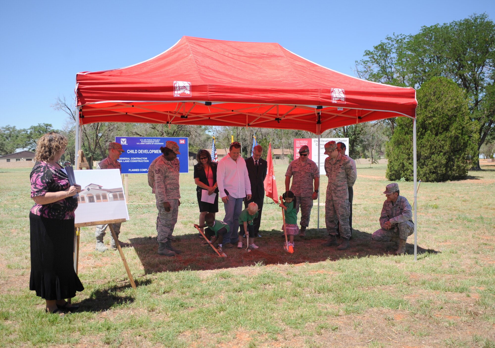 Col. Stephen Clark, 27th Special Operations Wing Commander, Col. Stephen Kimball, 27th Special Operations Mission Support Group Commander, Ms. Diane Ventura, Field Representative for Senator Bingaman, Mr. Ron Wilmot, Field Representative for Congressman Lujan and Darrell Calipo, RMA Project Manager all participated in the groundbreaking ceremony for the new Child Develpoment Center June 18. The project, headed by the Army Corps of Engineers, is funded by the American Recovery and Reinvestment Act of 2009. (U.S. Air Force photo by Airman 1st Class Maynelinne De La Cruz) 