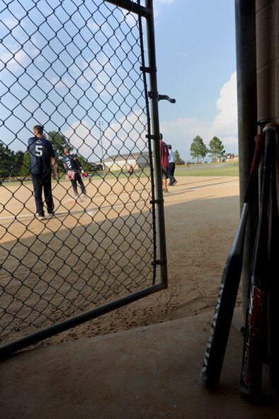 MOODY AIR FORCE BASE, Ga. -- The 23rd Equipment Maintenance Squadron munitions flight played against the 23rd Medical Group for the base softball championship here June 17. Many runs were scored by both teams, but 23rd EMS came out on top to win the championship. (U.S. Air Force photo by Airman 1st Class Benjamin Wiseman/RELEASED)