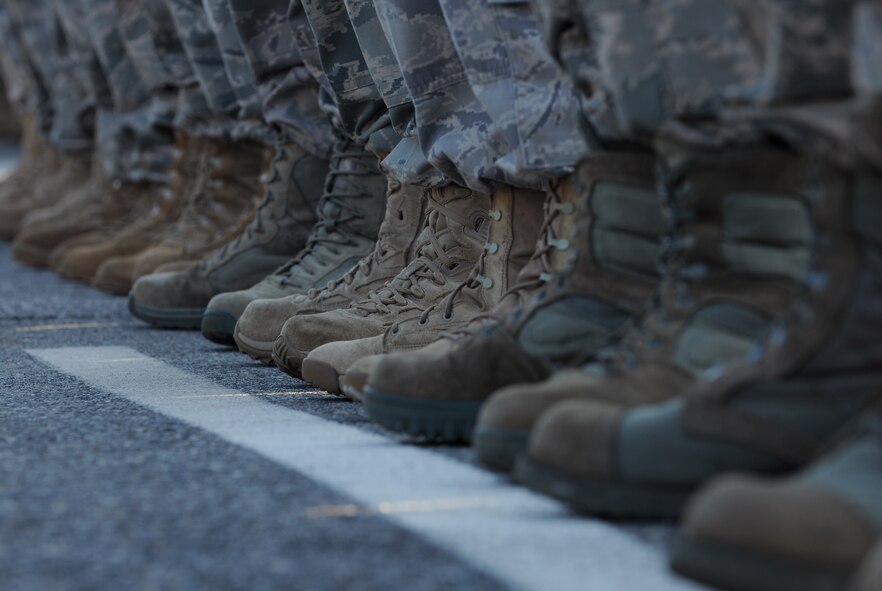 MOODY AIR FORCE BASE, Ga. -- Members of the 820th Security Forces Group stand at attention as the official party arrive for the 820th SFG change of command ceremony here June 18.  Col. Donald Derry, 820th Security Forces Group outgoing commander, released his command to Col. Randall Richert, 820th SFG incoming commander, during the ceremony. (U.S. Air Force photo by Airman 1st Class Benjamin Wiseman/RELEASED)