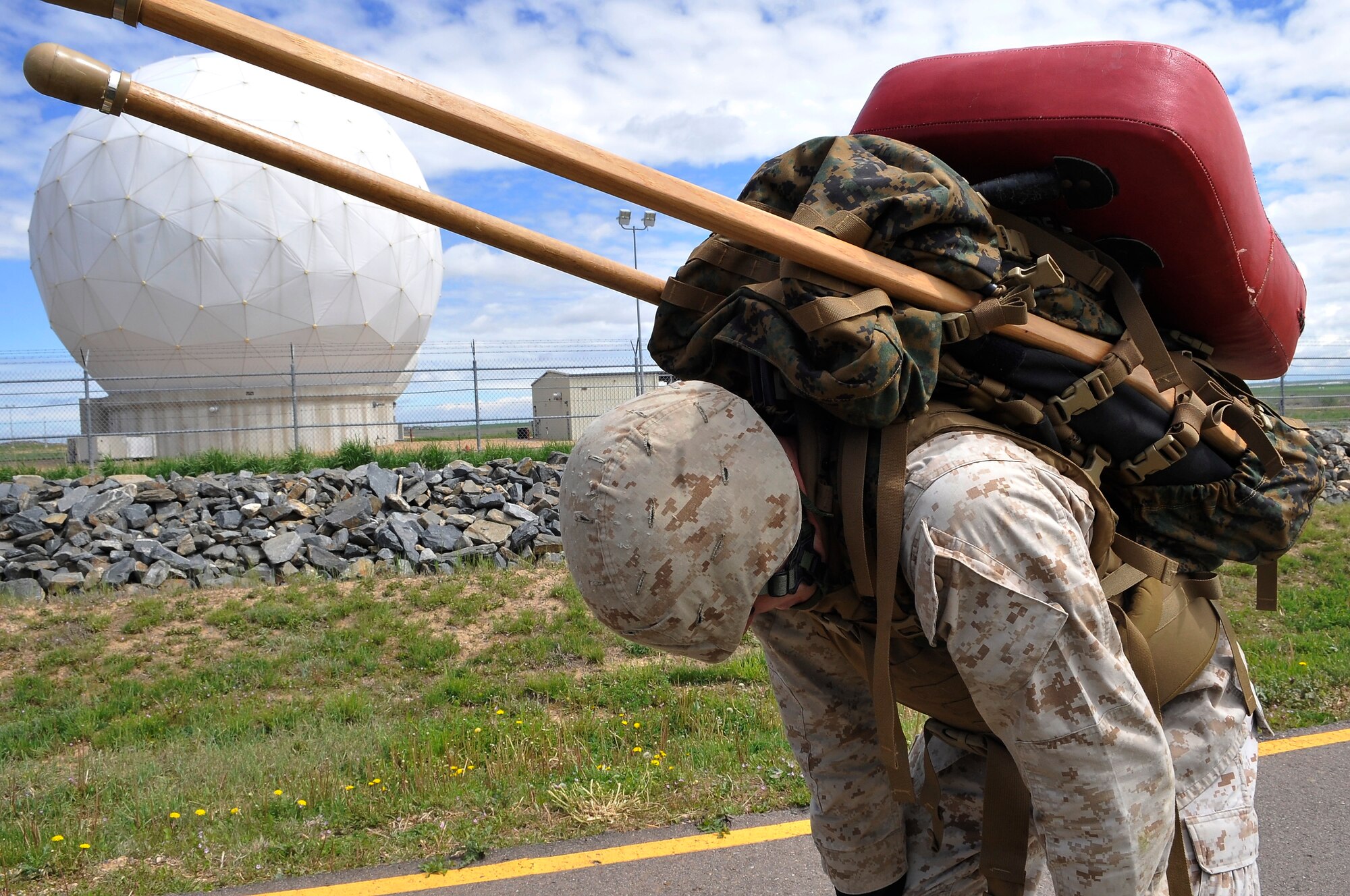 BUCKLEY AIR FORCE BASE, Colo. --Cpl Trent Wilcox, MACS 23 takes a quick rest. Most Marines who participate in advanced MCMAP training - especially the ones seeking their instructor tabs - are in excellent physical condition.(U.S. Air Force photo by Airman 1st Class Paul Labbe)



