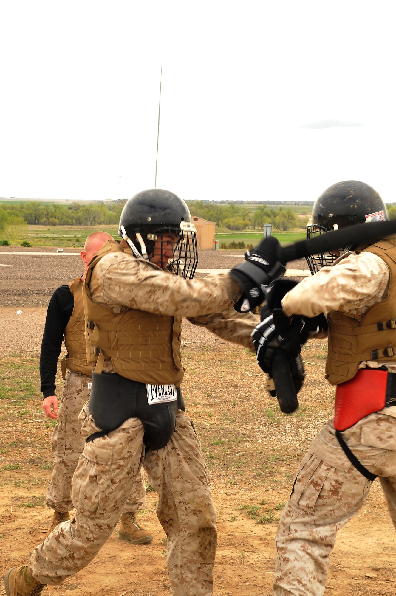 BUCKLEY AIR FORCE BASE, Colo. --Sgt Joshua Tucker, MACS 23 strikes Cpl Charles Bays during MCMAP course.The course is designed to incorporate a "continuum of force" system that allows Marines to escalate to the correct level of force in situations ranging from hand-to-hand combat to crowd control.(U.S Air Force photo by Airman 1st Class Paul Labbe) 

