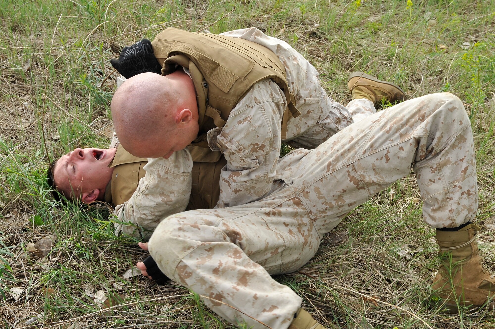 BUCKLEY AIR FORCE BASE, Colo. -- Macs 23 marines Cpl Charles Bays brawls with Cpl Trent Wilcox. Marine members take a three week Marine Corps Martial Arts Program course.(U.S Air Force photo by Airman 1st Class Paul Labbe) 
