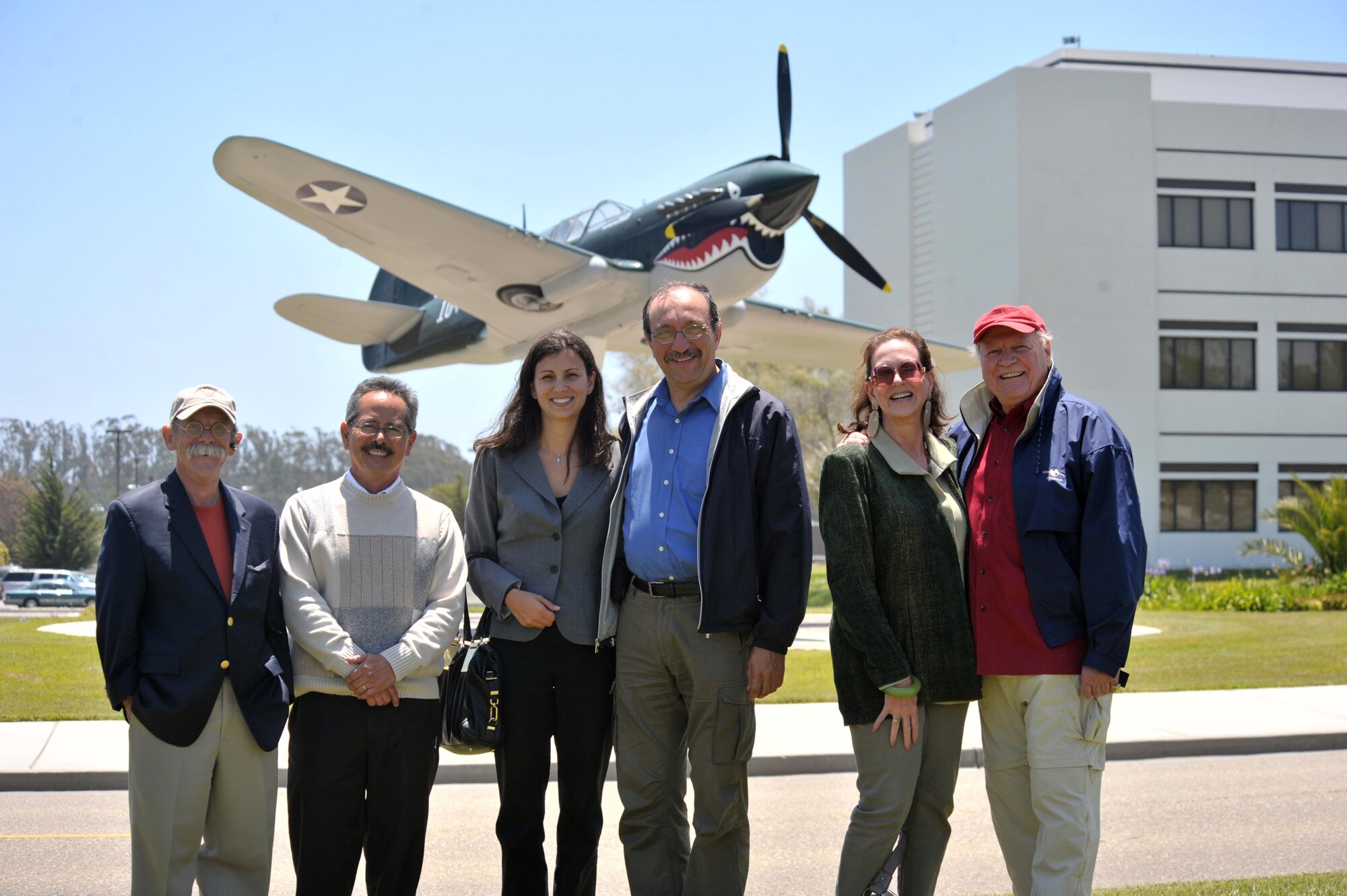 Civic leaders from the Los Angeles area stand in front of a static display
at Vandenberg Air Force Base on June 16 , 2010. The group toured various
locations during a Space Based Space Surveillance orientation initiated by
the Space and Missile Systems Center to provide a better understanding of
how the Air Force contributes to the space mission. (Photo by Atiba Copeland)