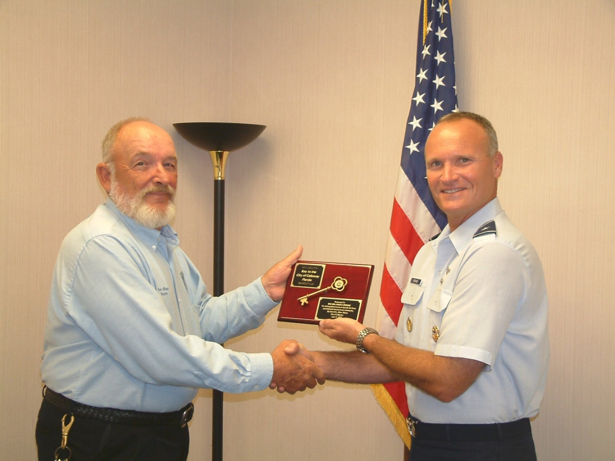 City of Callaway Mayor Kenneth Meer presented Brig. Gen. James Browne, 325th
Fighter Wing commander , with the key to the city of Callaway during a
meeting held at Callaway City Hall June 17.  Mayor Meer presented the key to
Gen. Browne, ".out of respect for the military and to honor his position as
the commander," according to Sandy Hirth, Assistant to the City Manager.
"Callaway is such a close 'neighbor' to Tyndall and we have so many retired
military personnel living within our borders that we feel it is highly
appropriate." (U.S. Air Force photo/courtesy photo)
