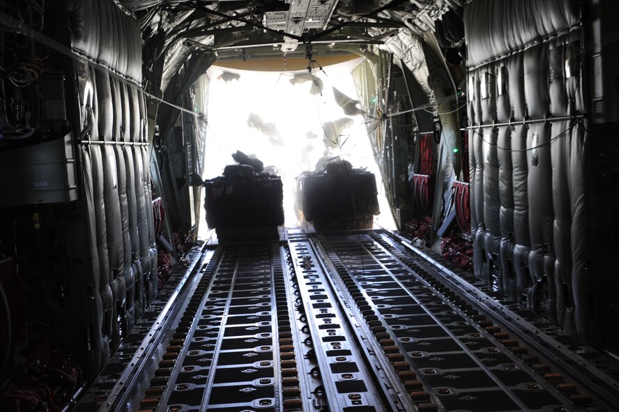 DYESS AIR FORCE BASE, Texas—22 bundles are released from the C-130J Super Hercules June 17 as part of a 22-bundle mass container delivery system airdrop at Bronte Drop Zone over Bronte city to demonstrate the capabilities of the C-130J-model. The regular C-130 Hercules’ are only capable of carrying 16 bundles. The 317th Airlfit Group will be training more on this to help prepare them for deployments. In the course of two years all of the old C-130 Hercules’ will be replaced by the new J-model. (U.S Air Force photo/ Airman 1st Class Shannon Hall)
