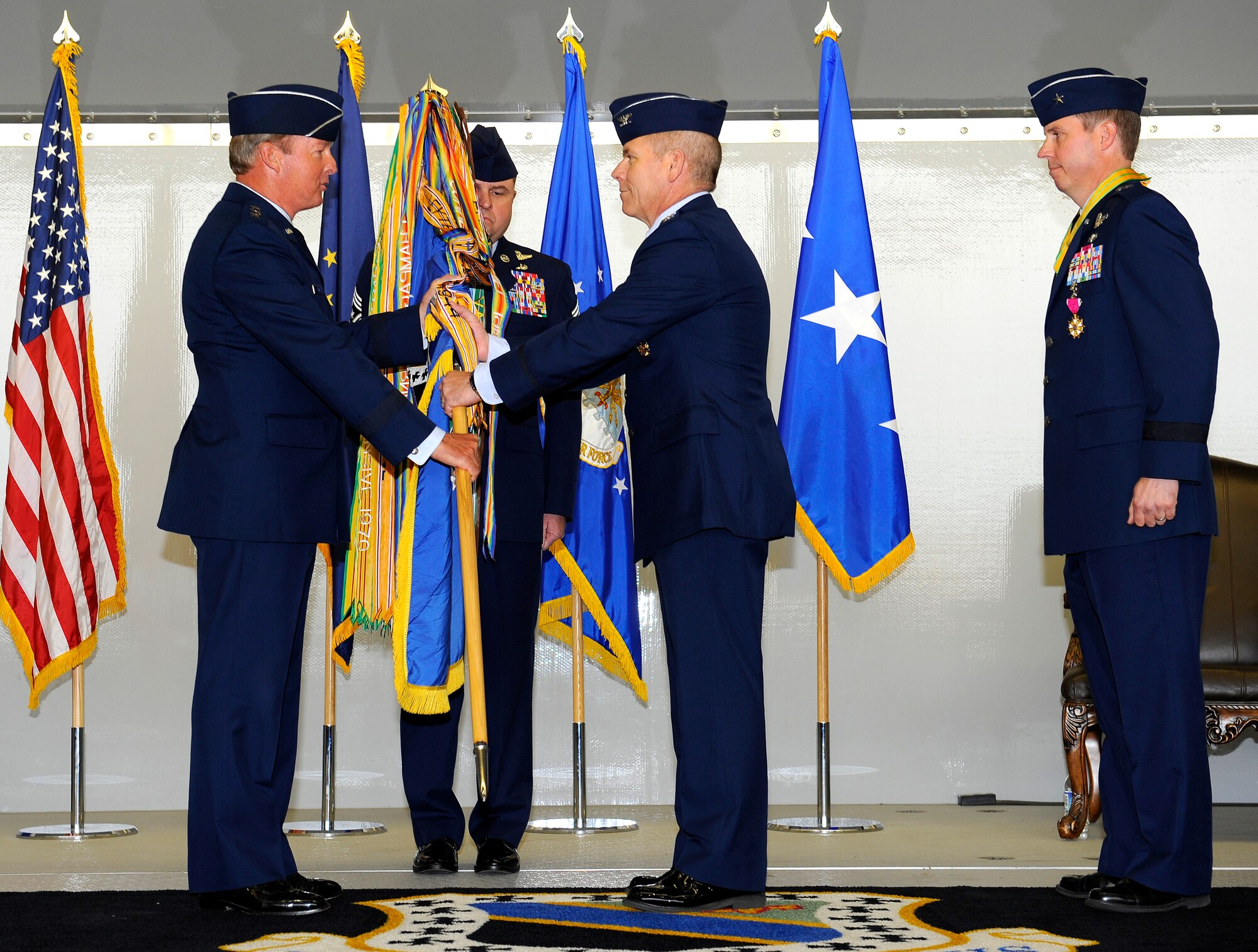 Col. John K. McMullen accepts command of the 3rd Wing from Lt. Gen. Dana T. Atkins during a change of command at Joint Base Elmendorf-Richardson, June 16.  (U.S. Air Force photo/Staff Sgt. Brian Ferguson)